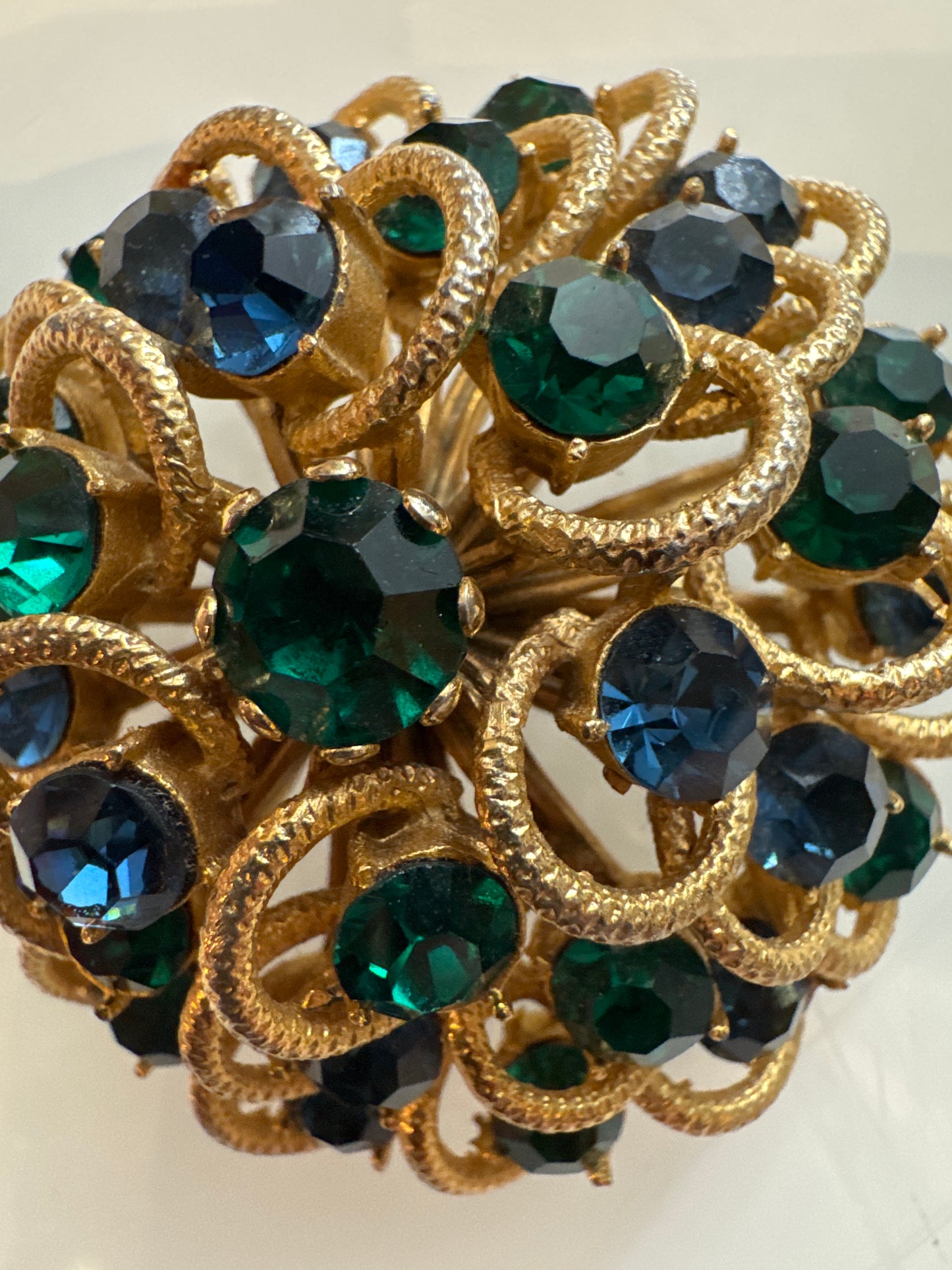 Beautiful 1950s unsigned dome brooch with blue and green rhinestones