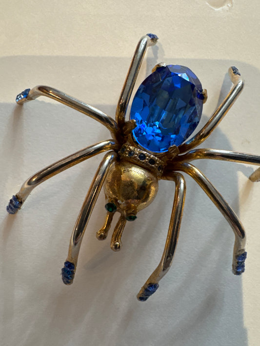 Little Miss spider, gold tone brooch with blue and green rhinestones. NYC