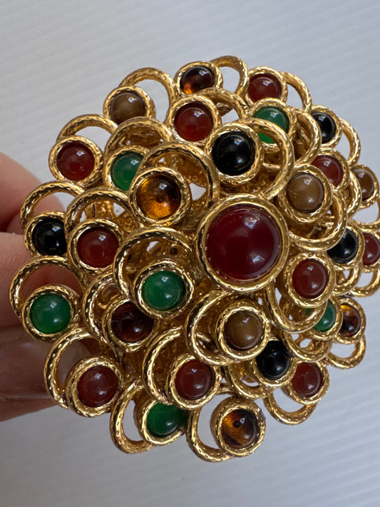 1960s brooch repurposed on a vintage cuff bracelet