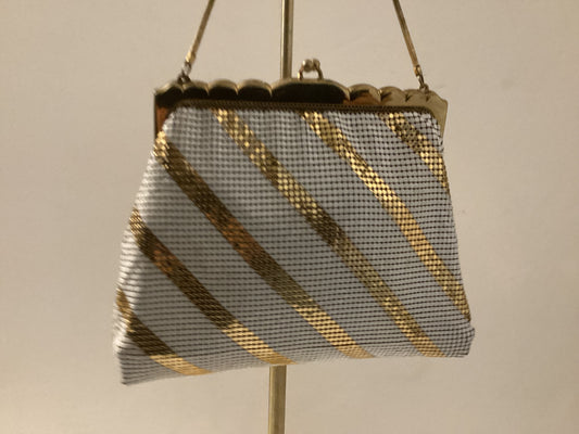 Gold and white Whiting and Davis Mesh bag with gold frame