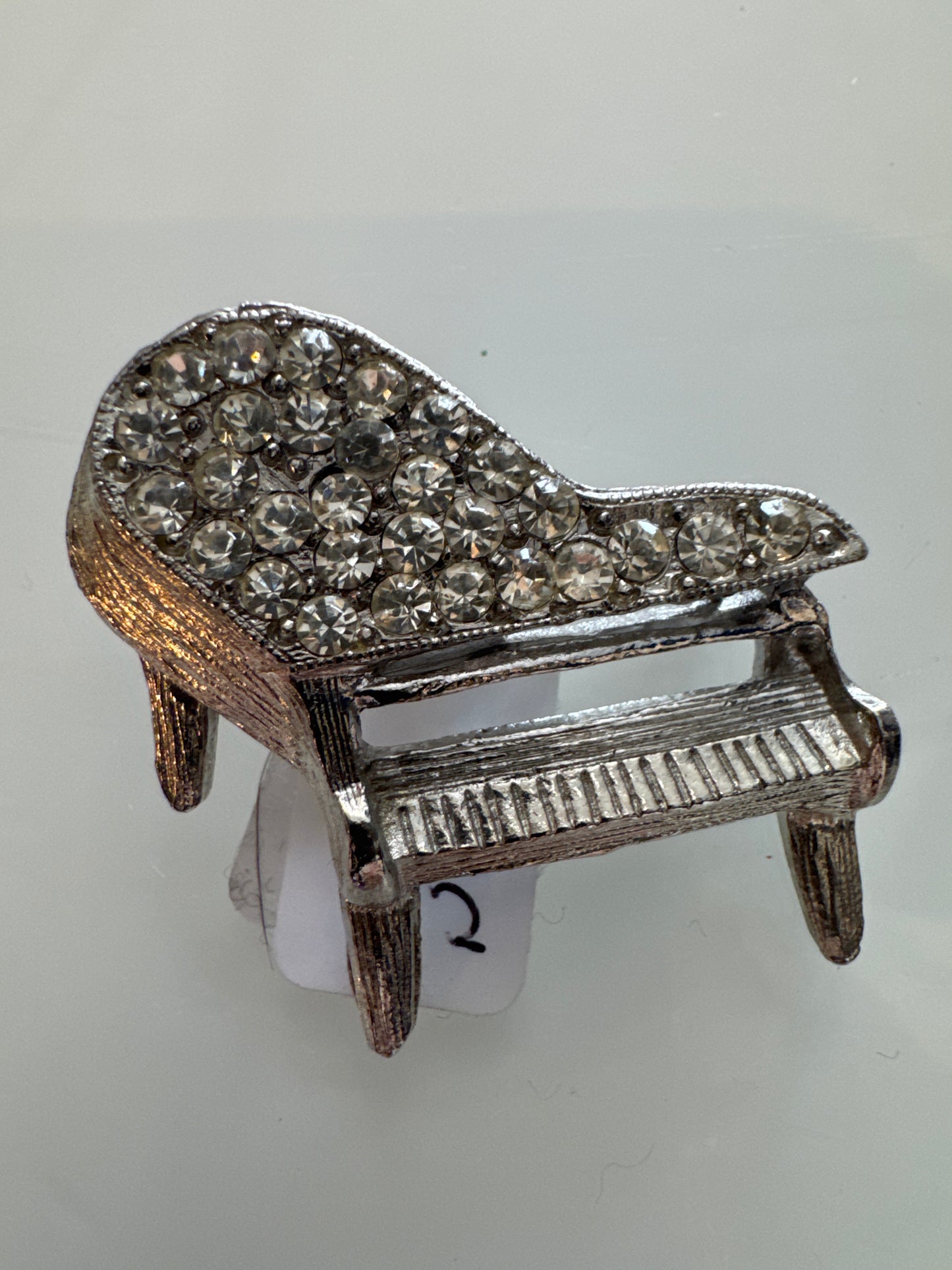 Mini Silvertone rhinestone piano brooch