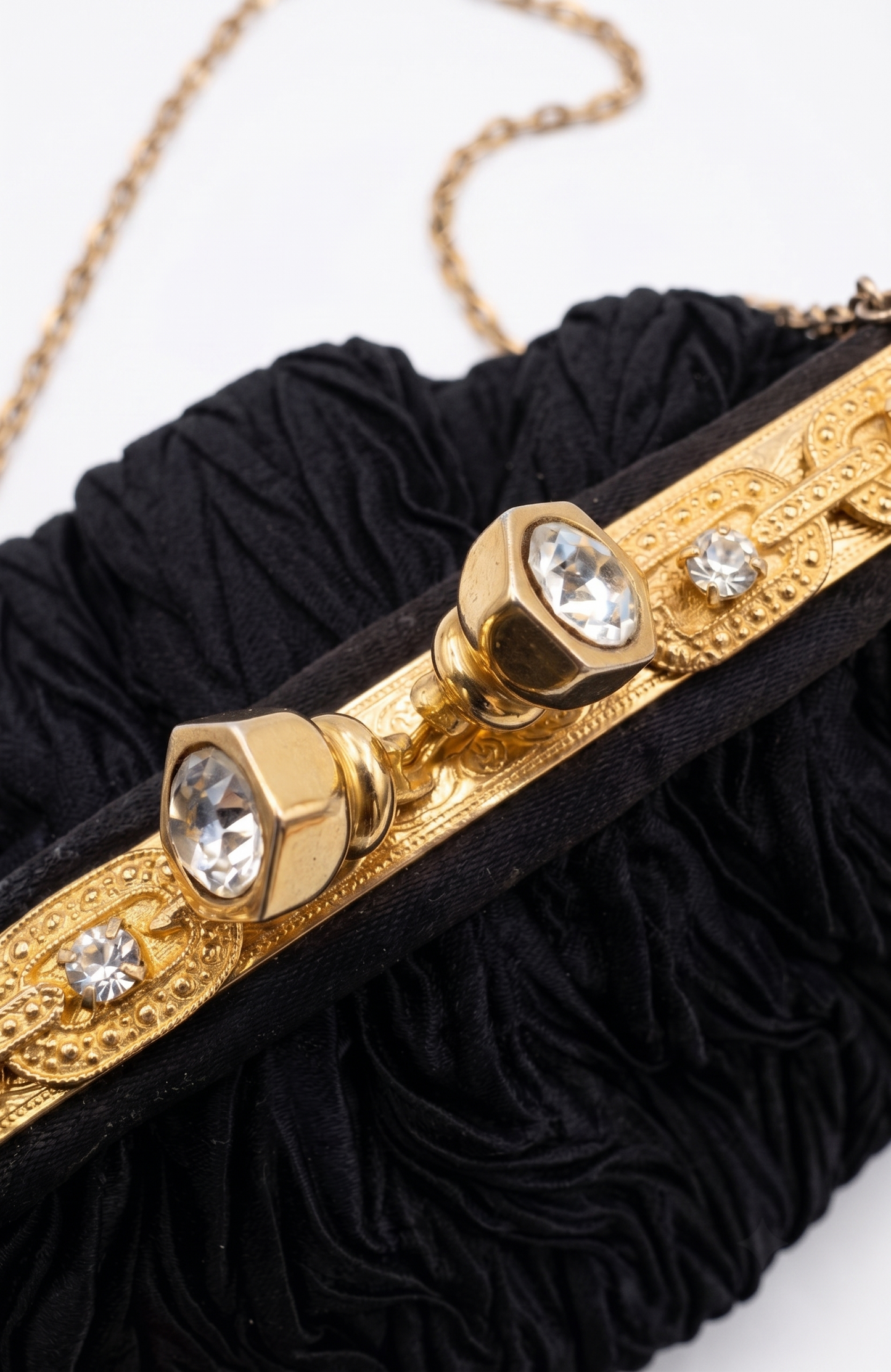 Elegant 1960s plisse black silk minaudiere evening bag with beautiful gold hardware and strap long enough for Crossbody