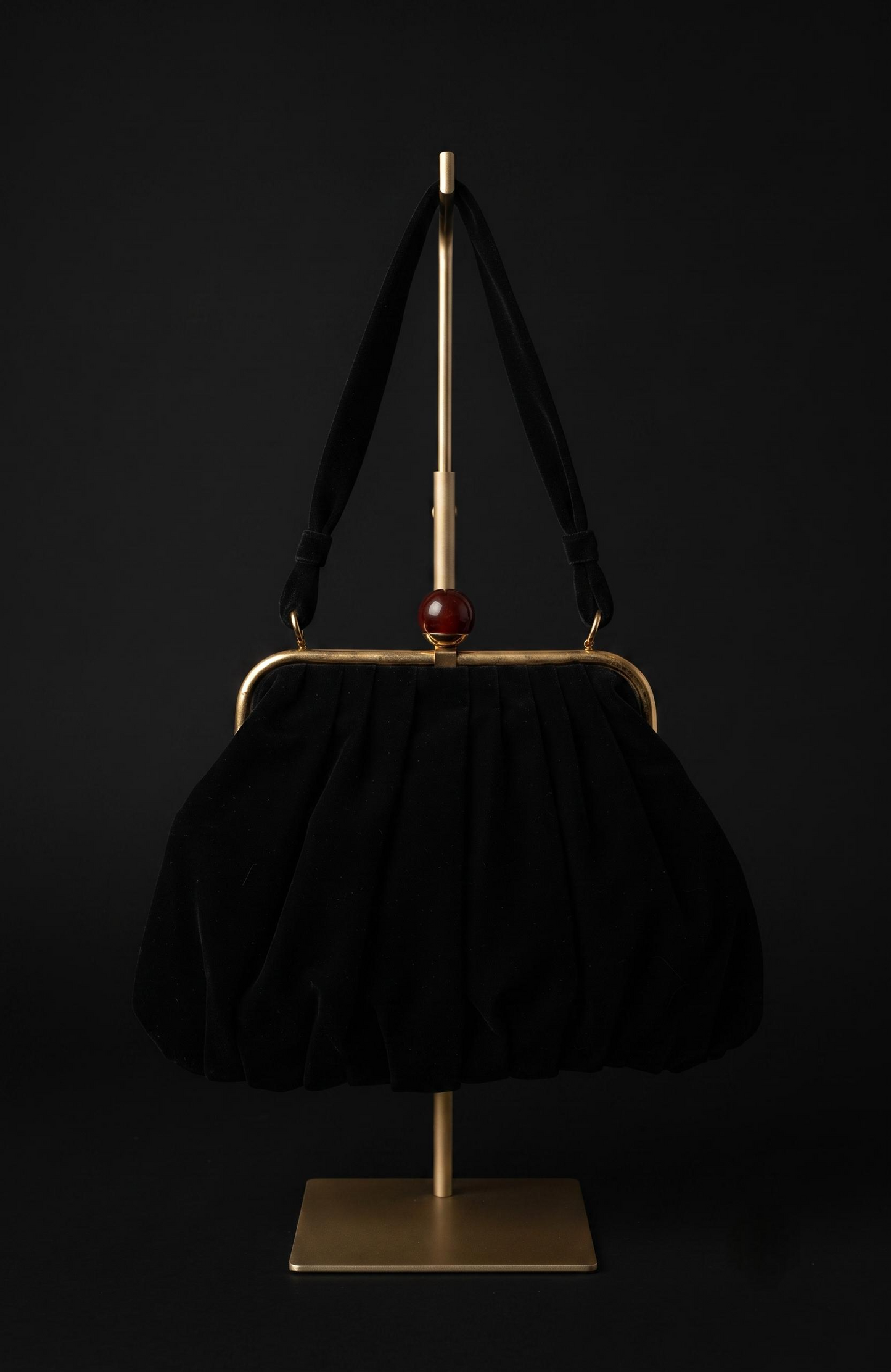 Bag is black suede 1940s with a bakelite top clasp