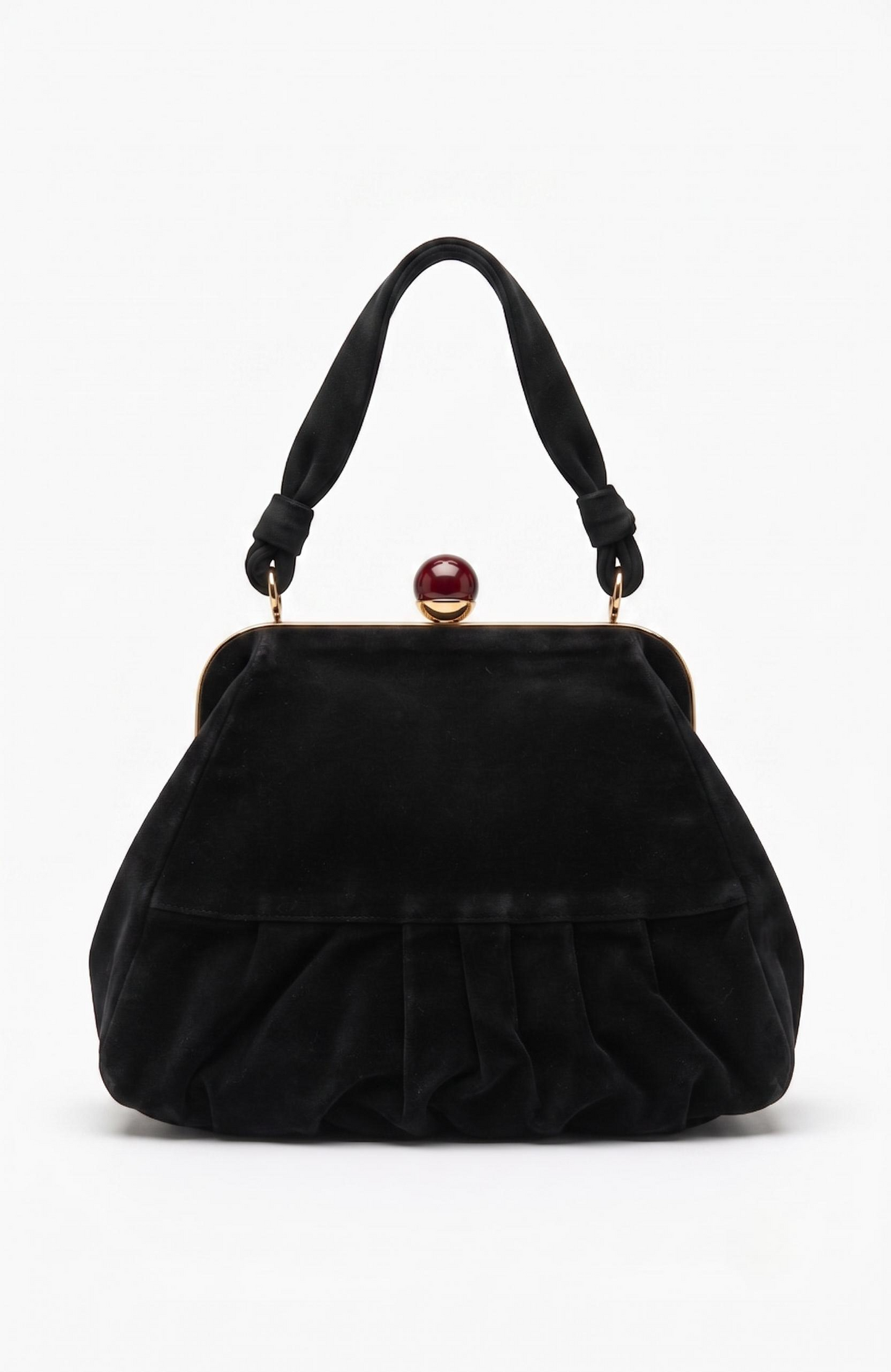 Bag is black suede 1940s with a bakelite top clasp