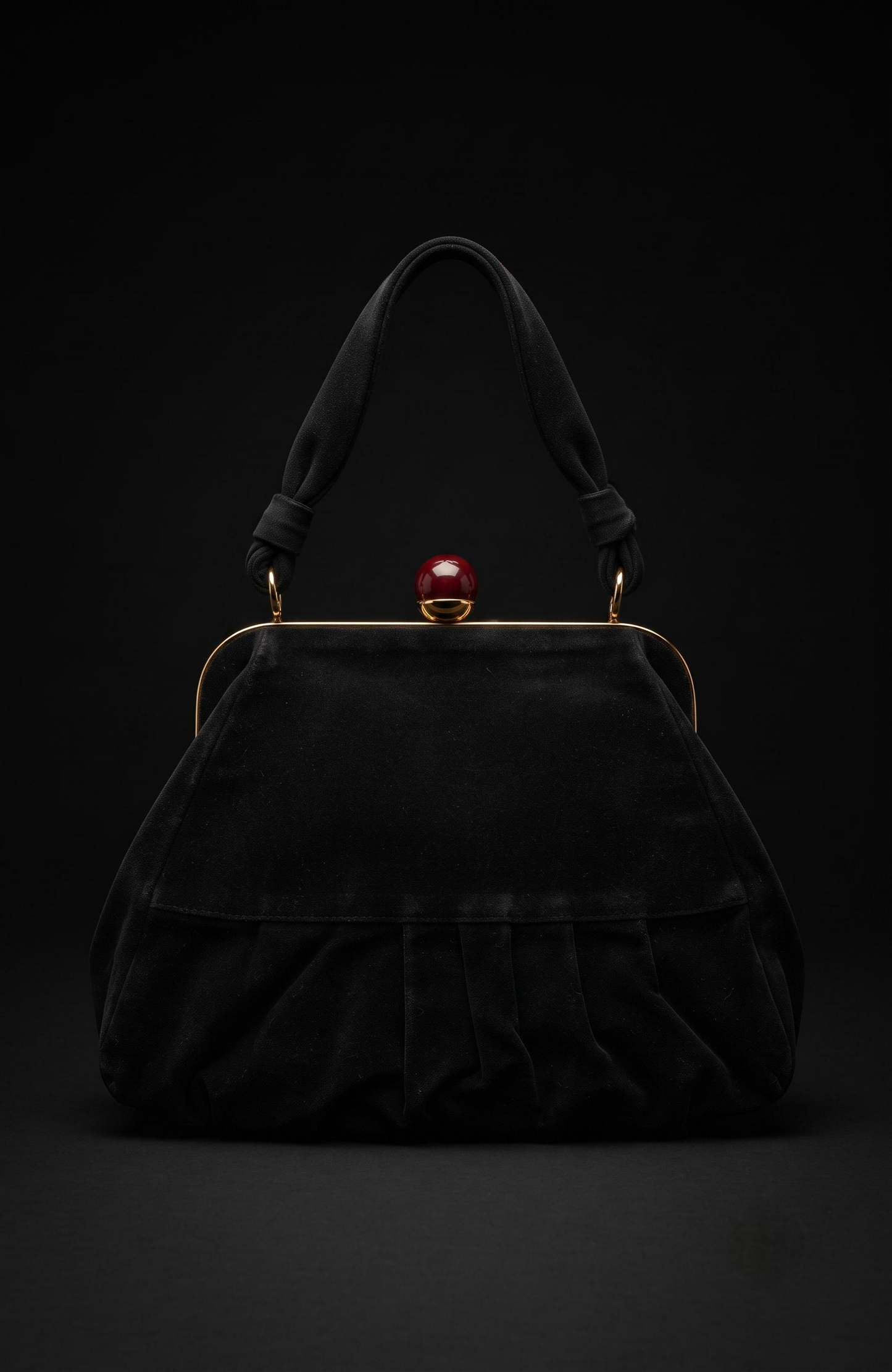 Bag is black suede 1940s with a bakelite top clasp