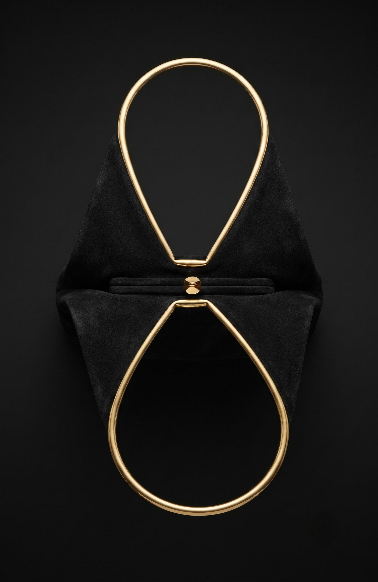 Geometric suede Bag from the 1940s with gold-tone details, it is black.