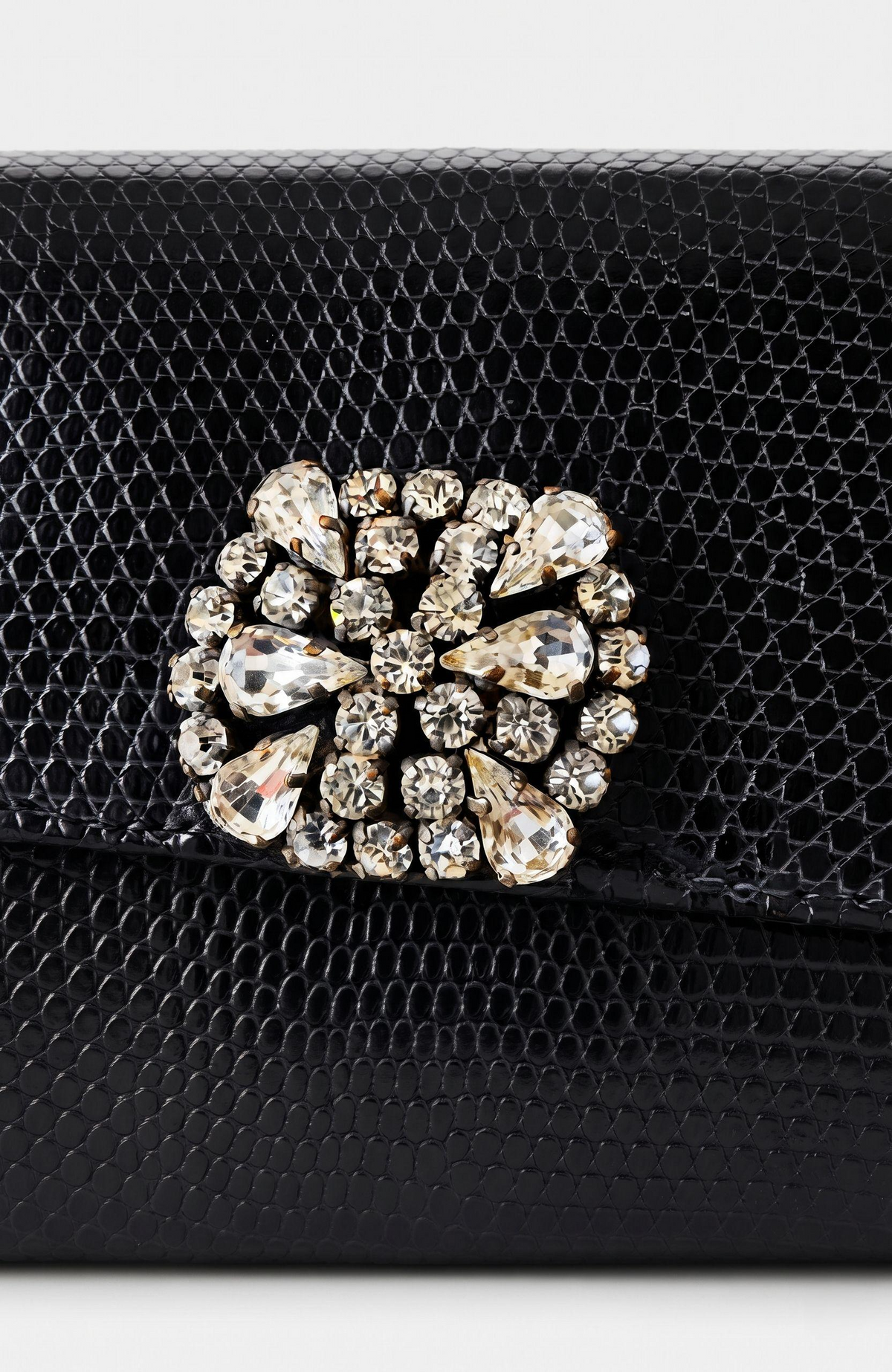 Beautiful bag 1970s black lizard clutch with rhinestone detail.