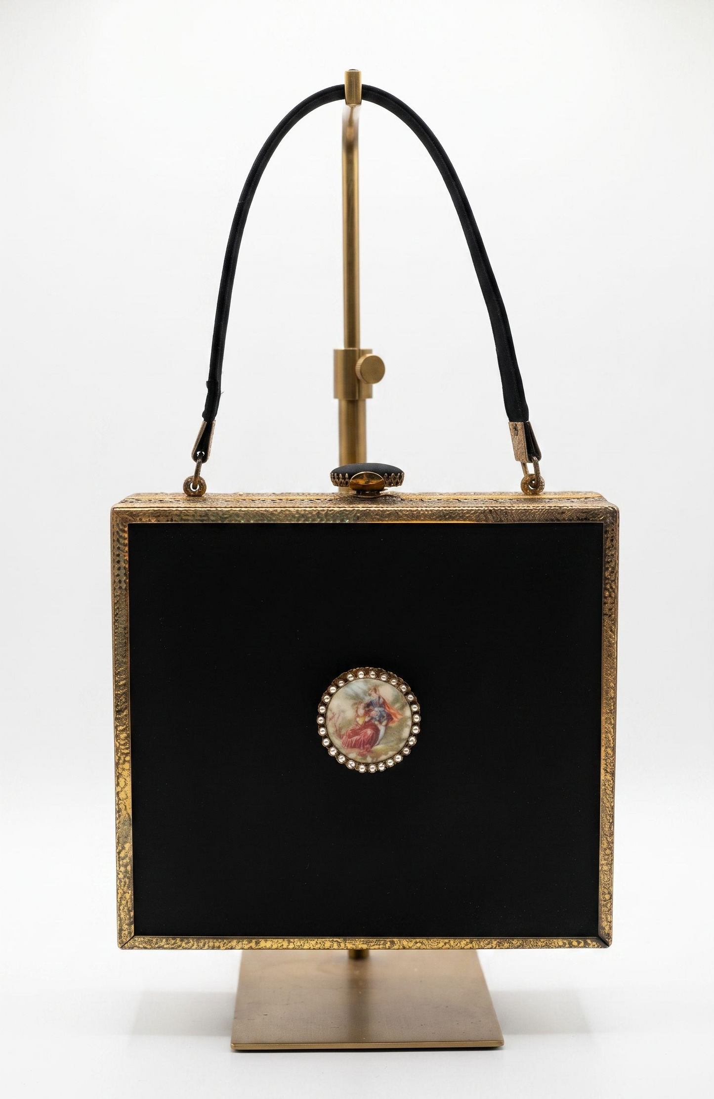 1940s black box bag with filigree design and "courting couple" cameo detail