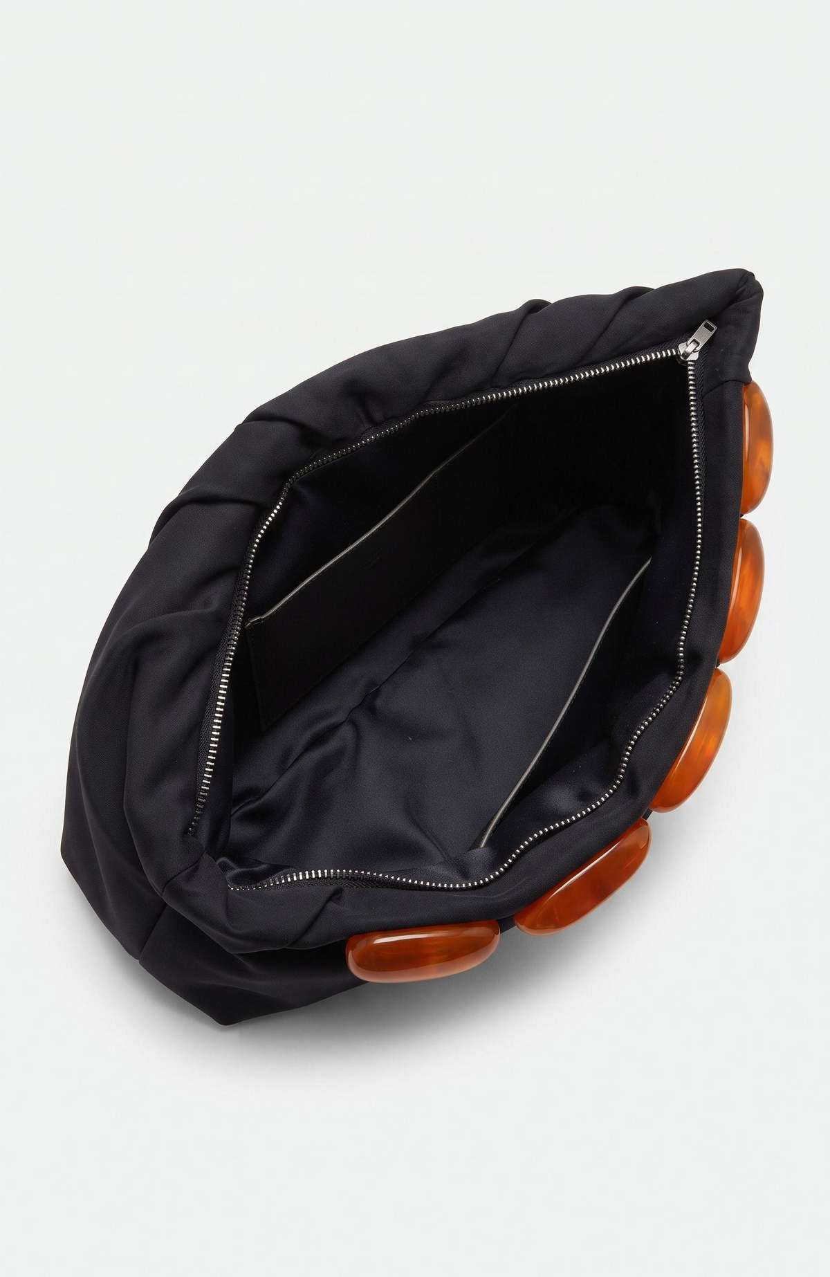 1940s black long clutch with a beautiful bakelite detail