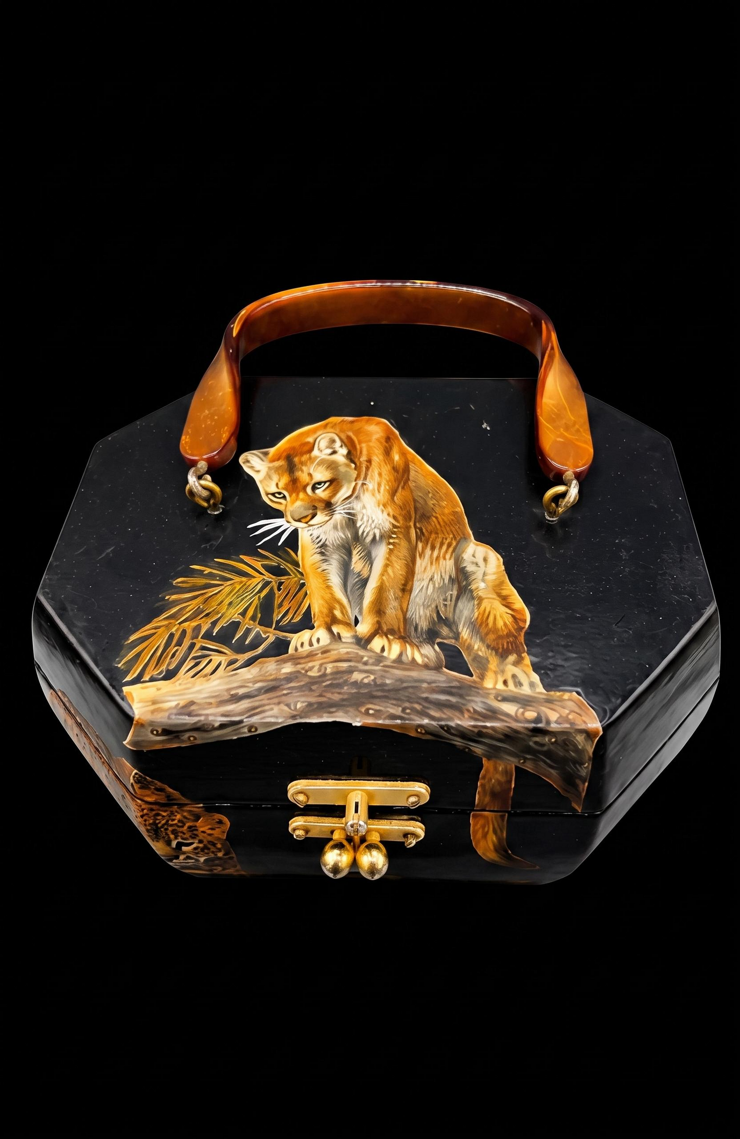 Vintage black lacquer wooden handbag with leopard decoupage and brass clasps. from 60-70s inside bright quirky fabric appropriate for decade.