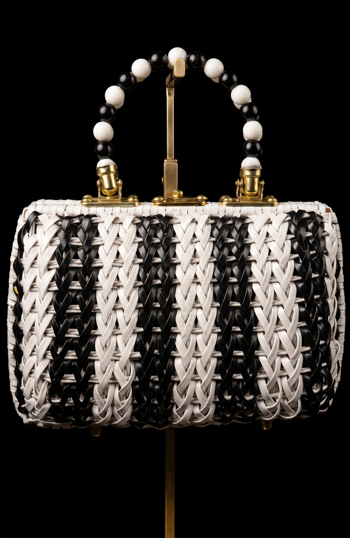 Beautiful 1950s black and white wicker top handle bag with beaded handle and fabric interior