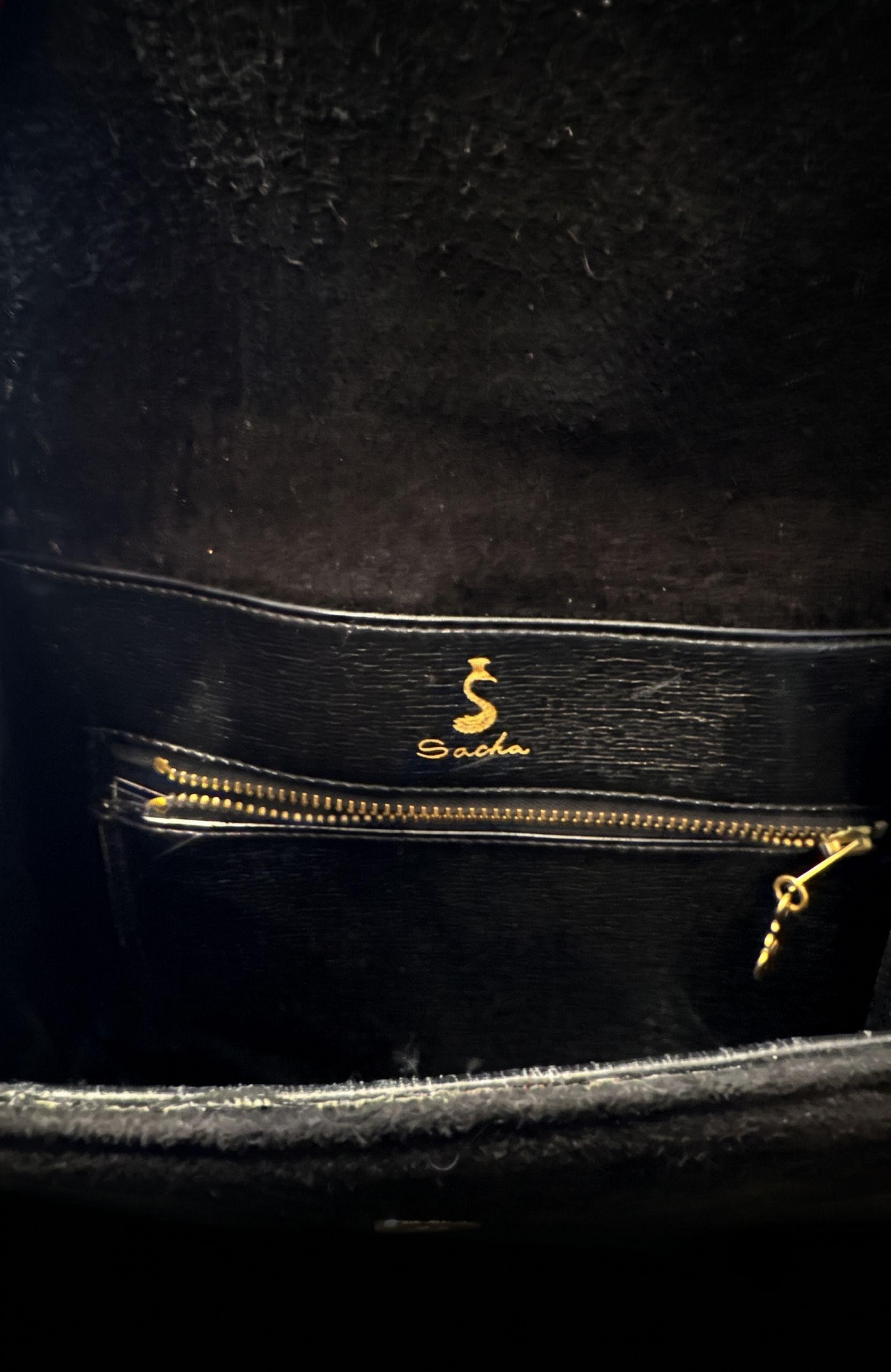 Stunning 1970s black suede with gold hardware shoulder bag. RARE and unique.