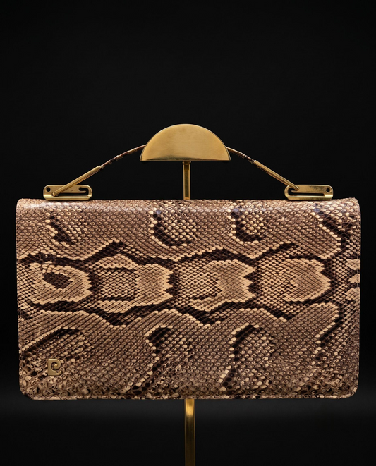 Vintage 1960s Pierre Cardin snakeskin  bag that can be worn as a top handle or the handle folds down, and it can be worn as a clutch.