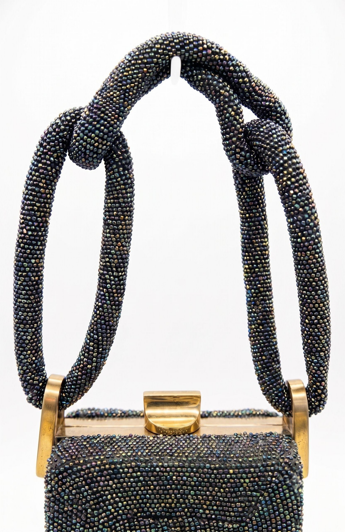 gorgeous 1940s beaded bag with dark green blue and bronze beading. Extra thick handle in mint condition.