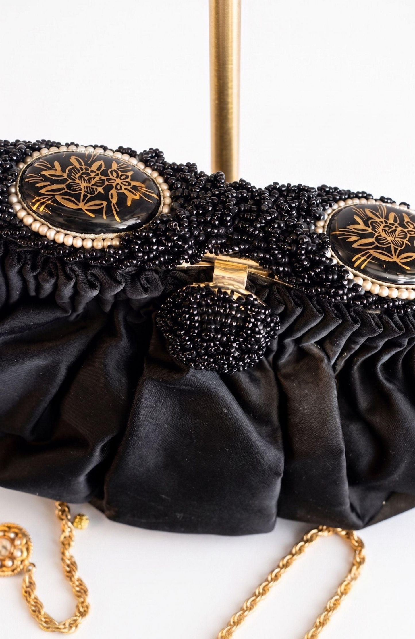 Beautiful 1930s satin black opera evening bag, with delicate chain and beautiful black beading and flower cameo detail at closure