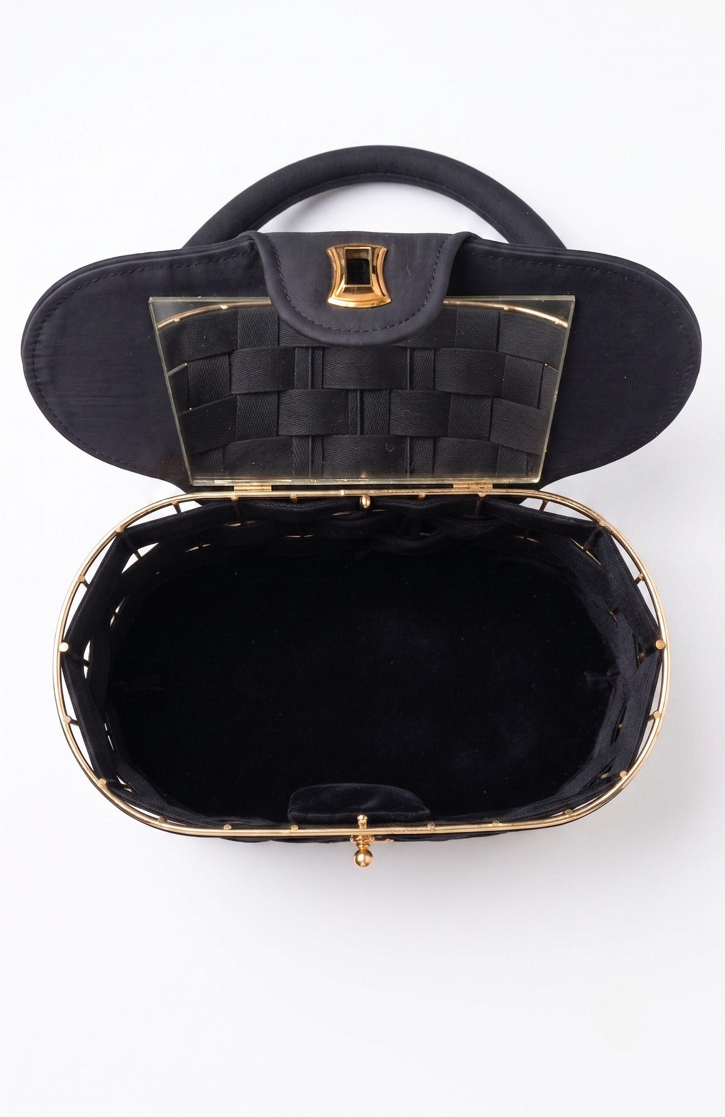 It is a 1940s black suede box Bag with woven suede and gold tone detailing