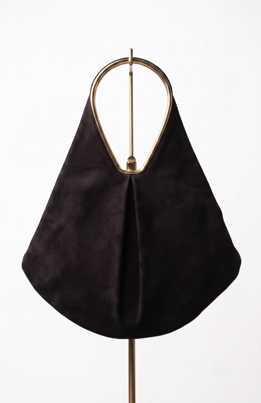 Geometric suede Bag from the 1940s with gold-tone details, it is black.