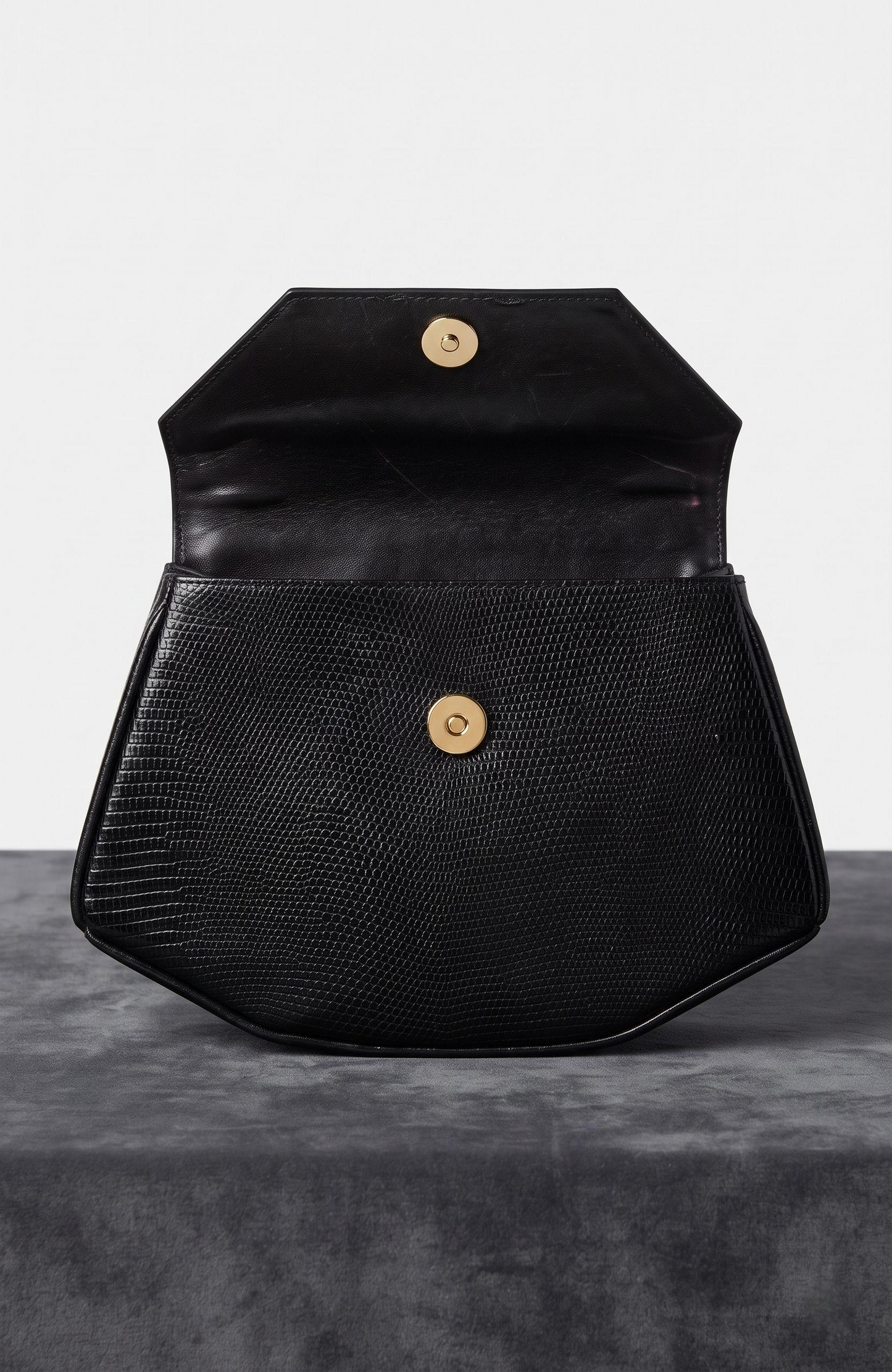 Beautiful bag 1970s black lizard clutch with rhinestone detail.