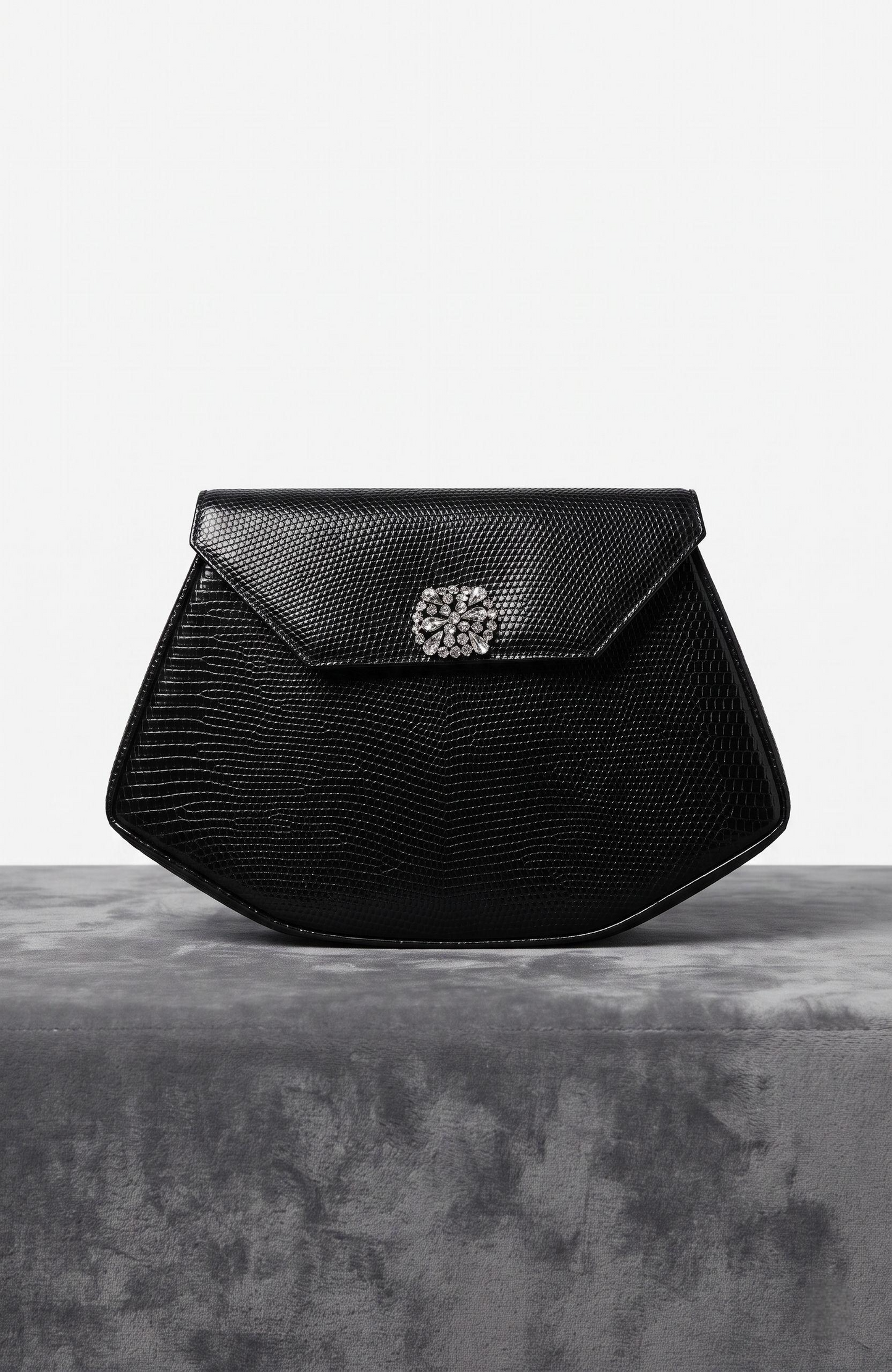 Beautiful bag 1970s black lizard clutch with rhinestone detail.