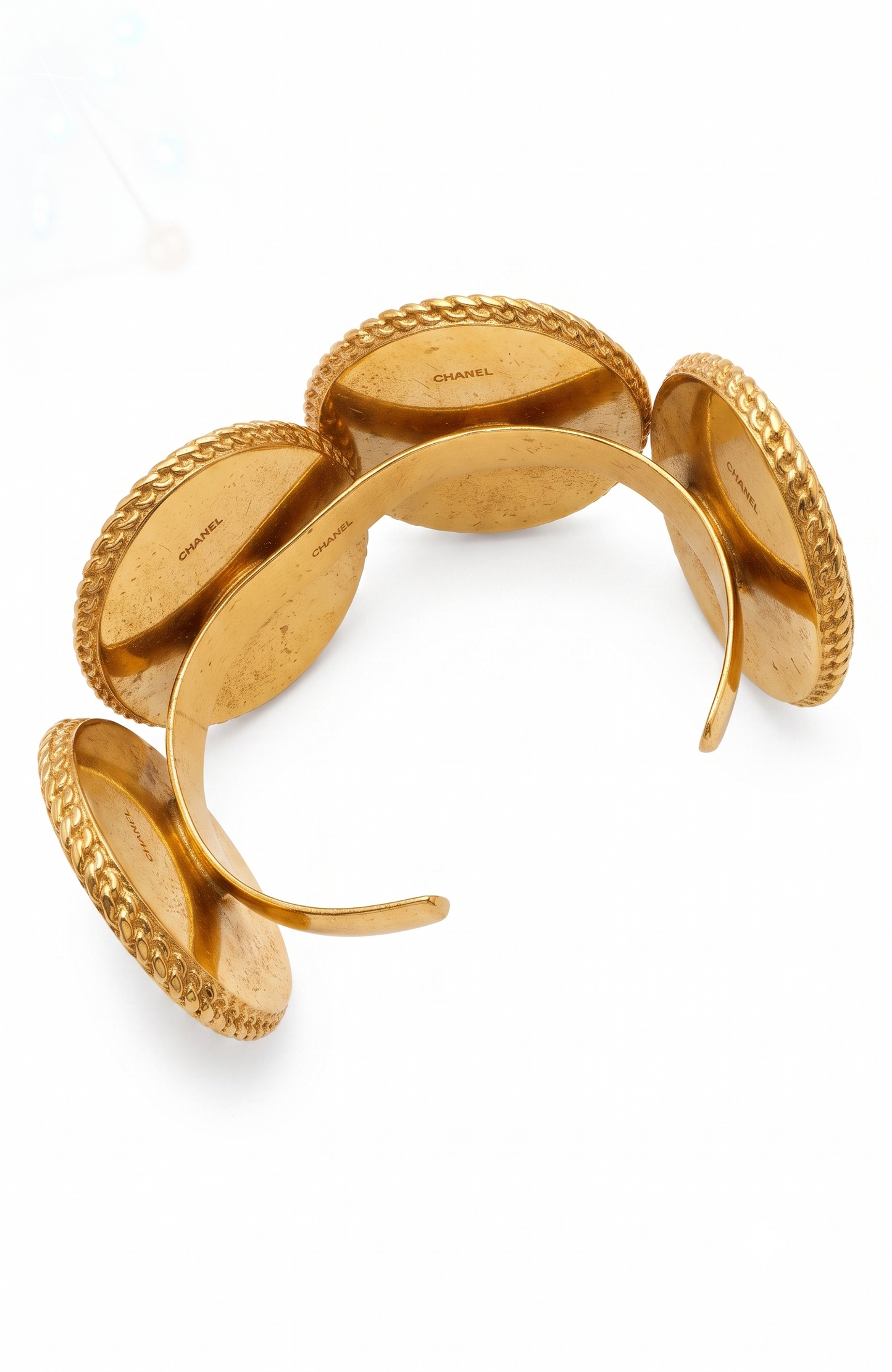 Chanel 1990s carved cameo motif large cuff bracelet with 4-cameo 2" cameo plates featuring a horse, 2 Coco portraits and a renaissance girl.