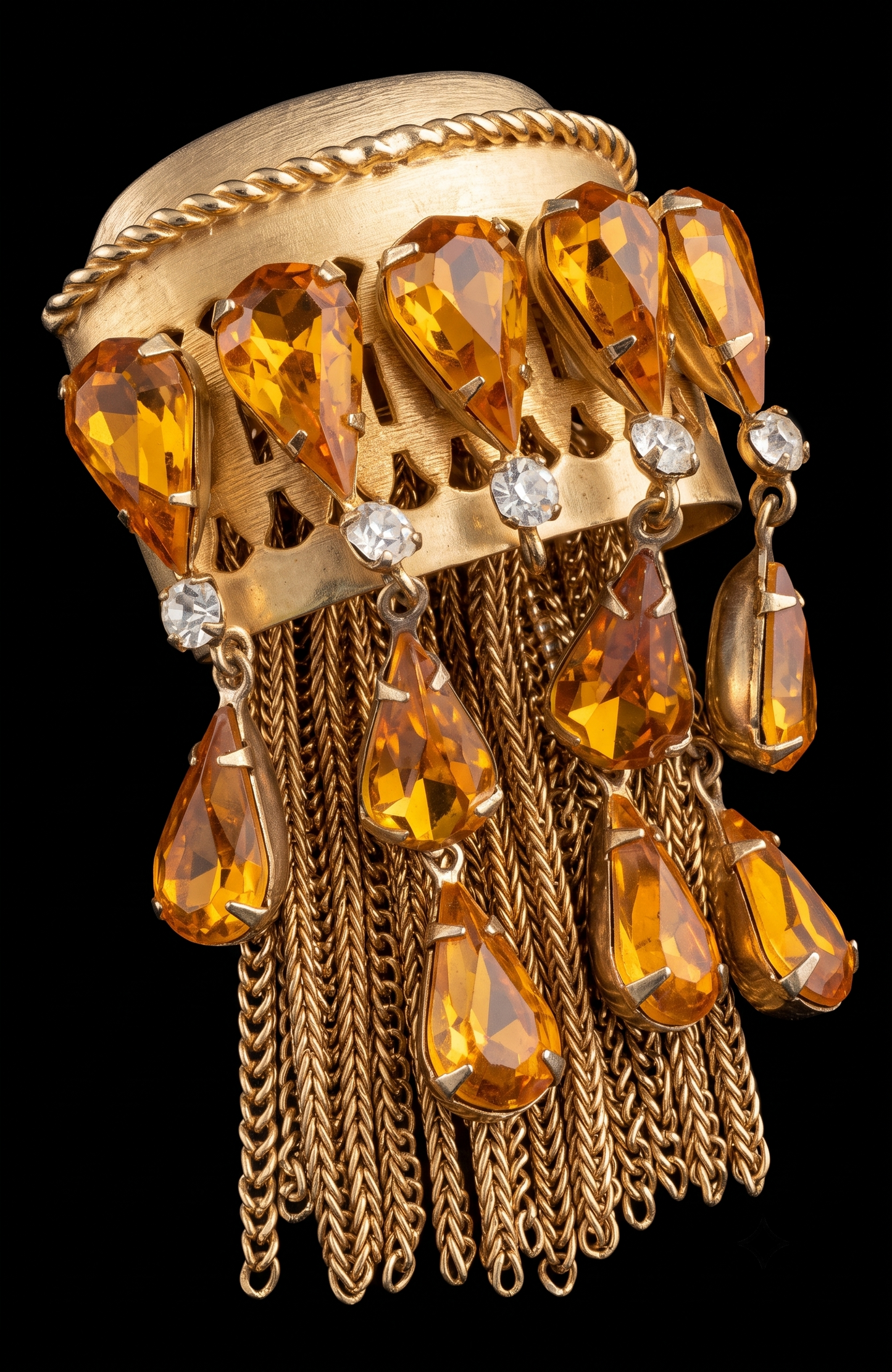 Joseff of Hollywood gold brooch with domed top and cascades of 13 prong set large citrine glass teardrops and 5 round white glass rhinestones w/ tassels.Unsigned Joseff of Hollywood was created for a specific actress for a specific film.