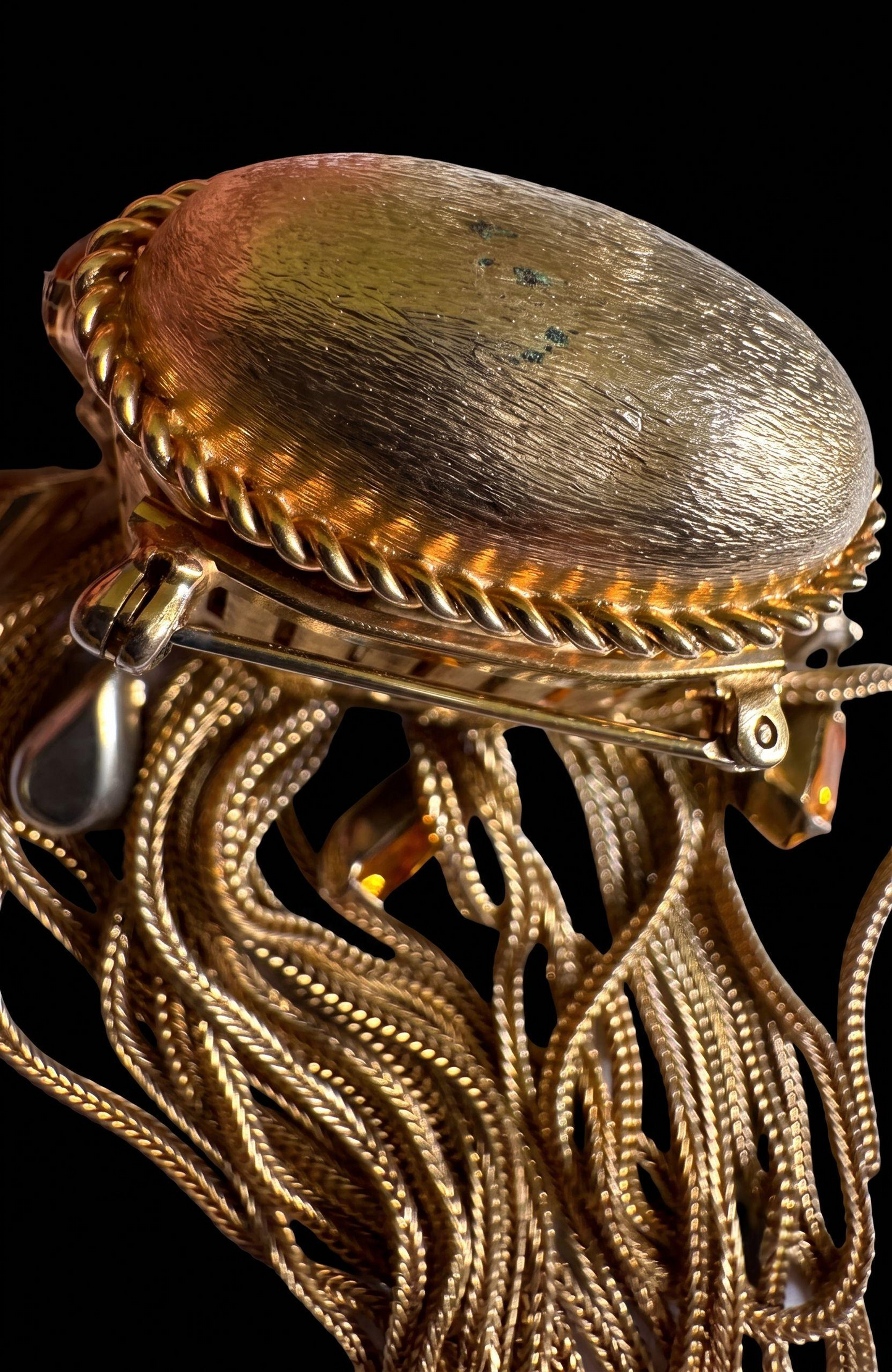 Joseff of Hollywood gold brooch with domed top and cascades of 13 prong set large citrine glass teardrops and 5 round white glass rhinestones w/ tassels.Unsigned Joseff of Hollywood was created for a specific actress for a specific film.