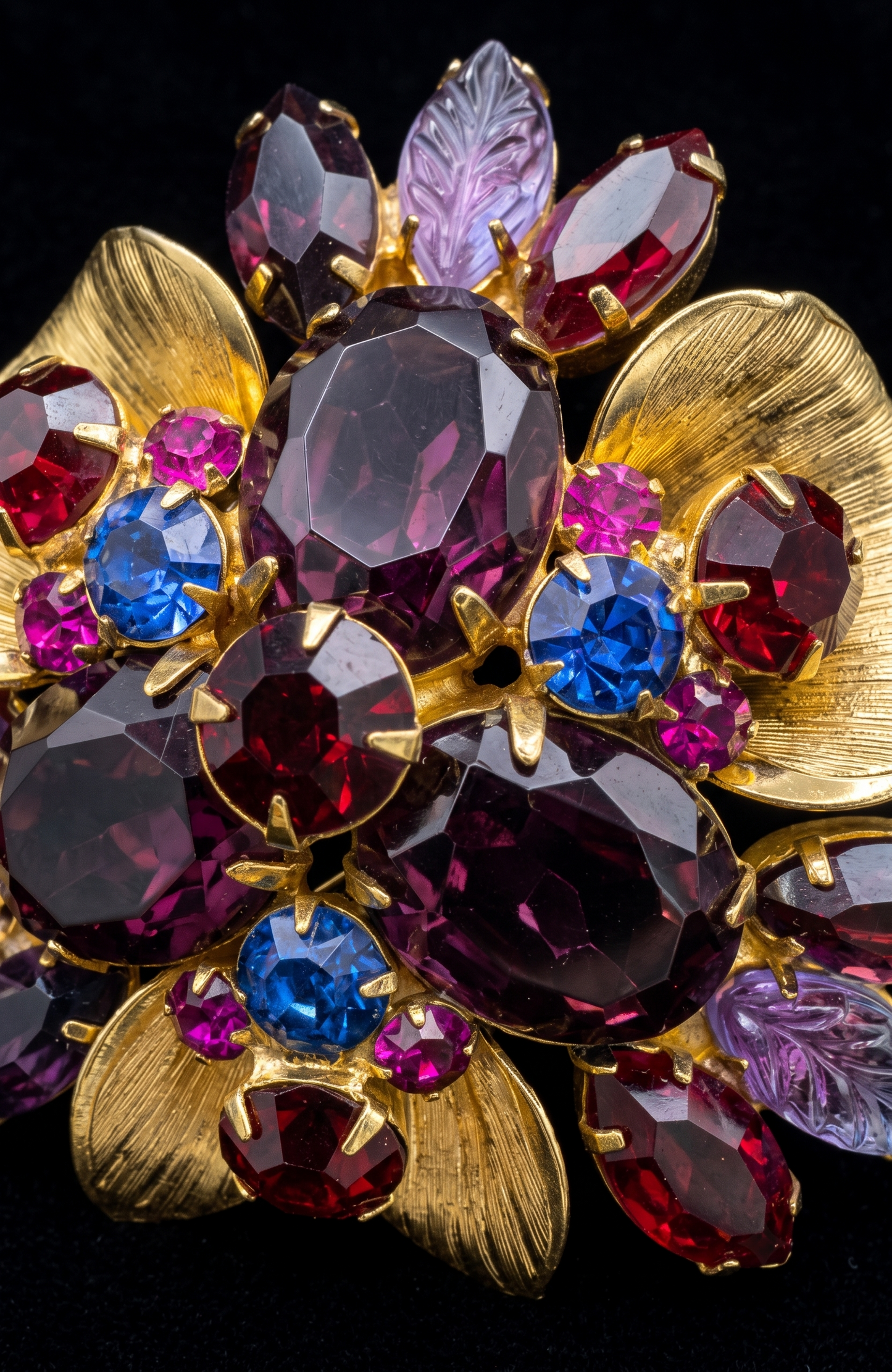 DELIZZA & ELSTER beautiful vintage brooch with purple blue, magenta, and red rhinestones