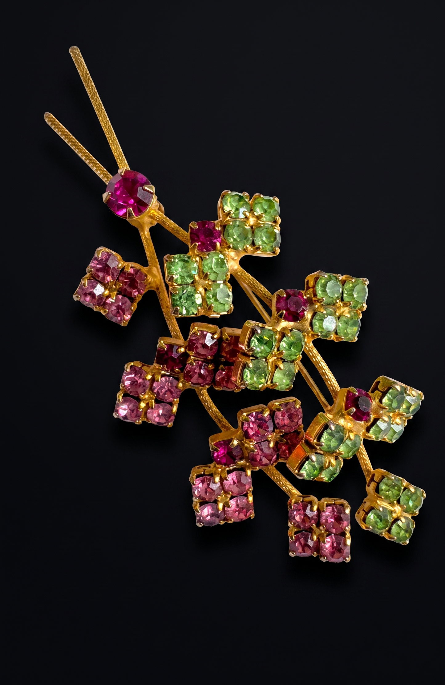 Beautiful mid-century, floral spray, brooch featuring pink and green rhinestones on a gold tone back