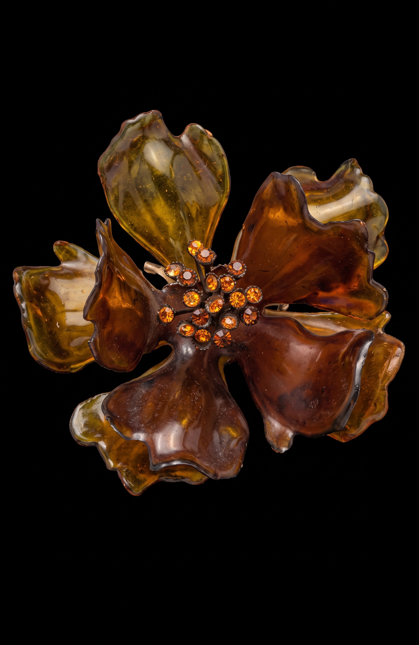 1960s giant amber colored lucite brooch with center rhinestones