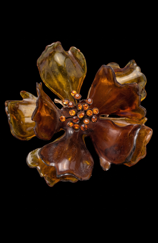 1960s giant amber colored lucite brooch with center rhinestones