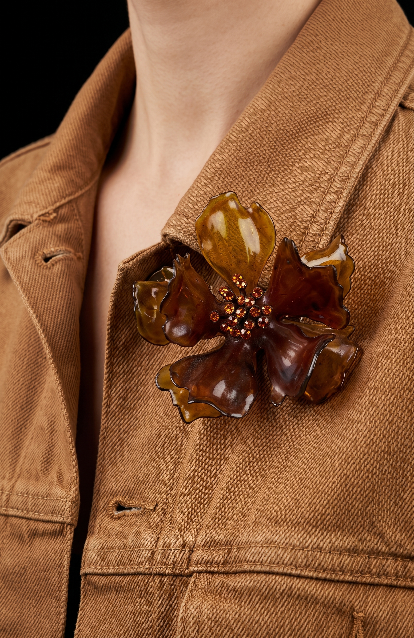 1960s giant amber colored lucite brooch with center rhinestones