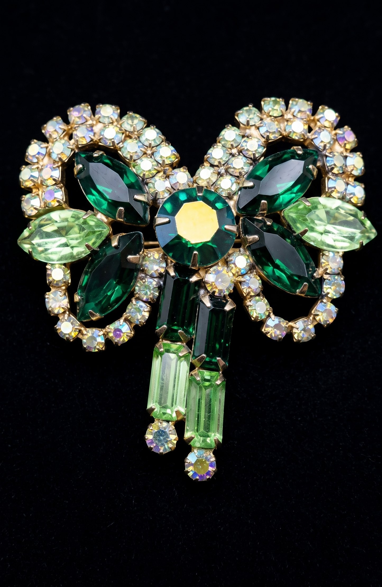 Beautiful 1950s shades of green bow brooch with aurora borealis