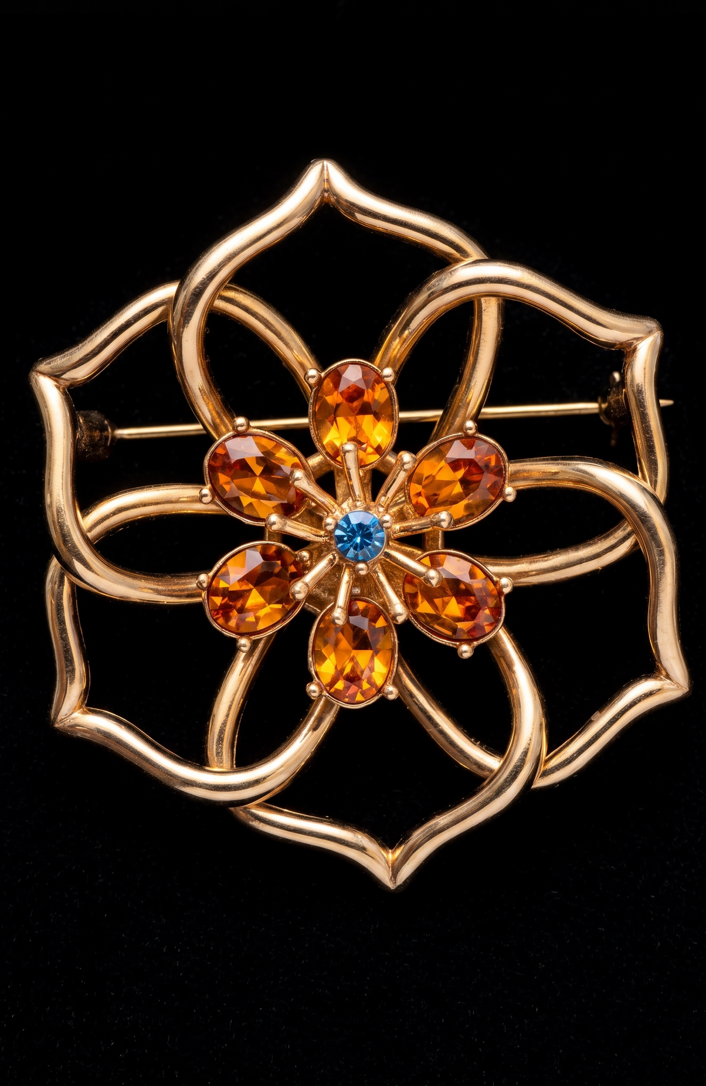 Vintage Weingeroff gold tone flower brooch/pendant with orange and blue glass rhinestones