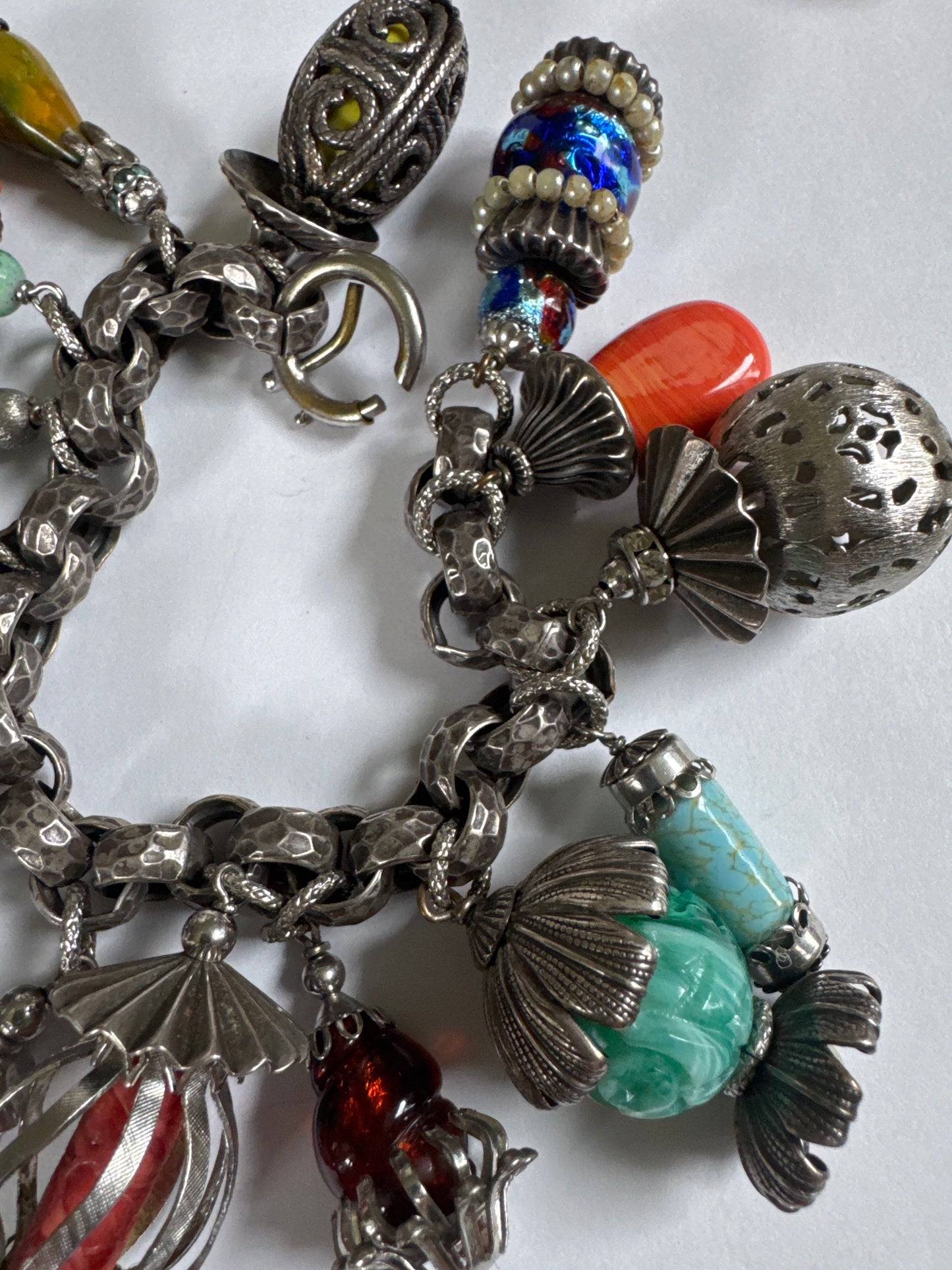 1950s signed NaPIER "latern" charm bracelet by Eugene Bertolli. Book piece on page 309 of The Napier Co.