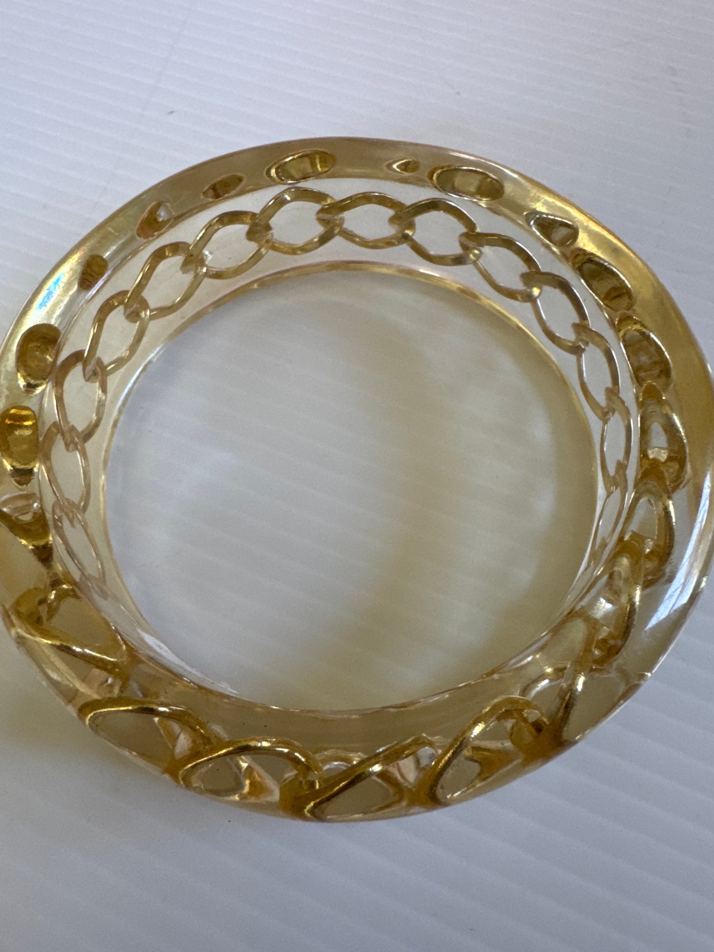 1990s resin bracelet with gold link chain inside
