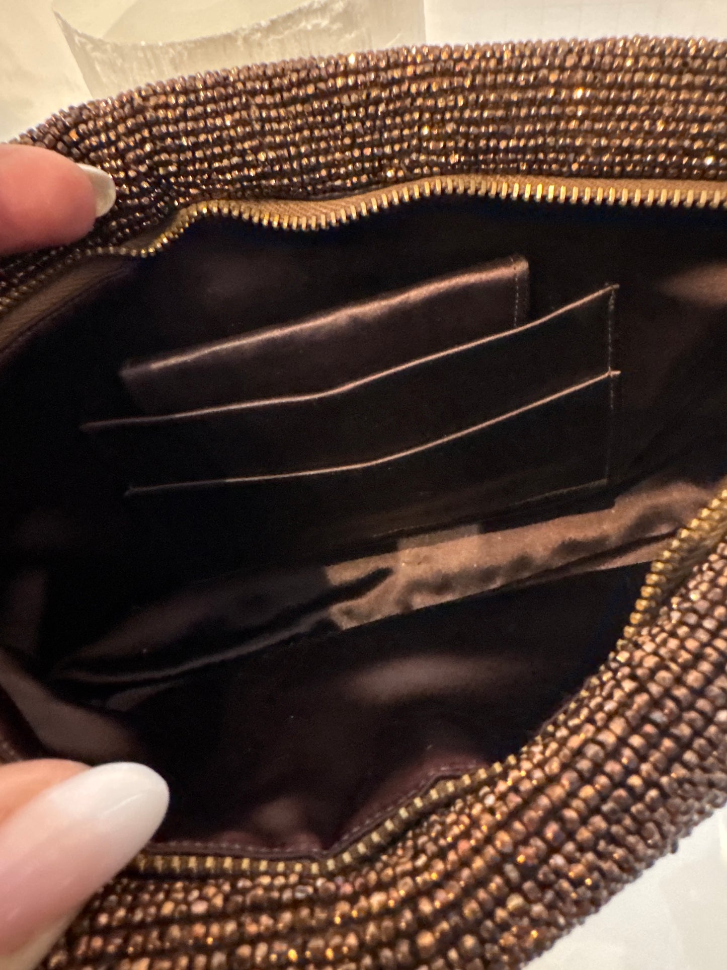 Show stopping bronze beaded clutch from the 1940s with zipper. Mint condition.