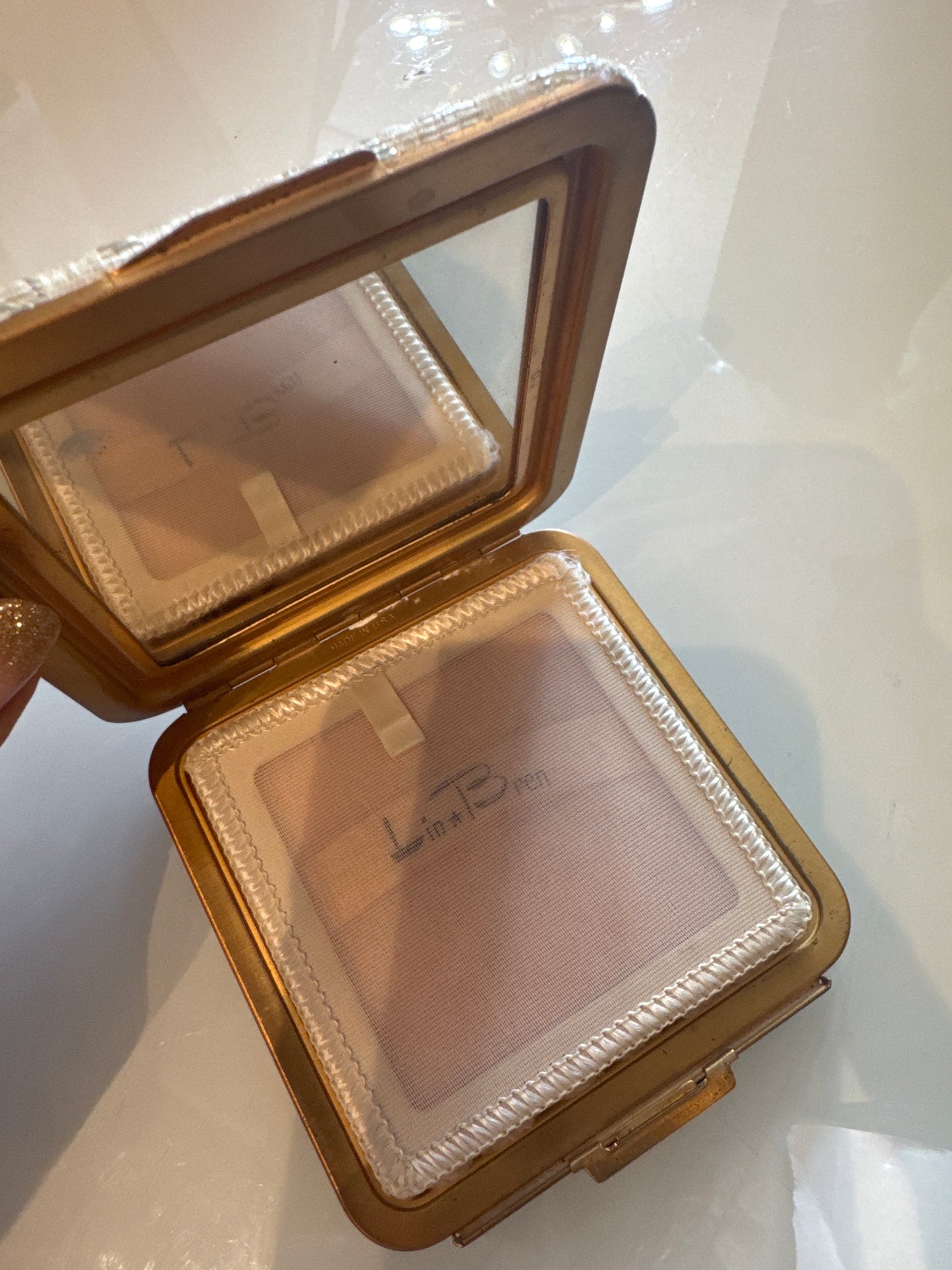 Beautiful brocade, Makeup, compact and coin purse with slide lock. Designed  in the 1950s by LIN BREN.