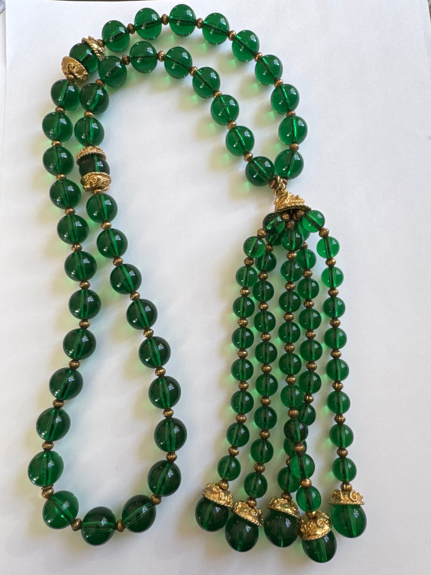 Absolutely stunning signed Kenneth Lane 1970s green glass bead tassel necklace.