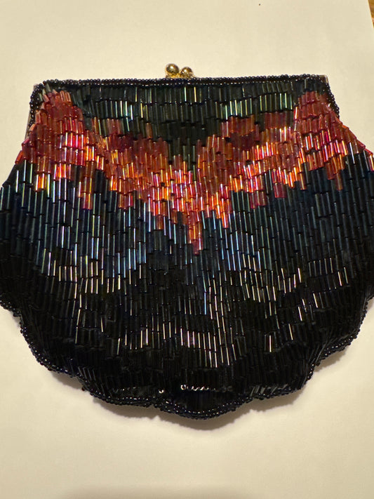 Vintage La Regale beaded bag with chain that can be worn as a Crossbody. Has original tag attached. Road