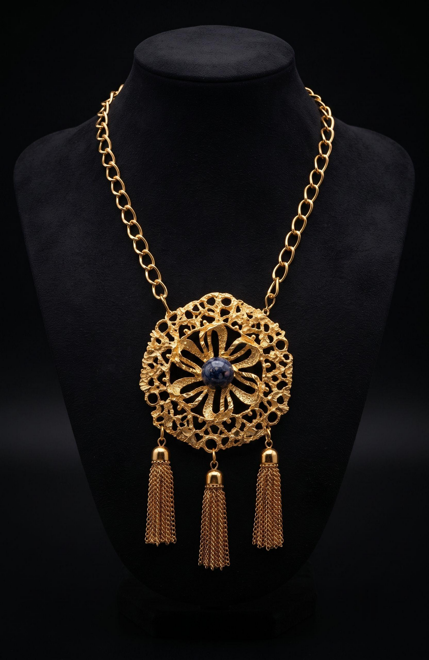 1970s jumbo pendant necklace with blue cabochon stone, and tassels