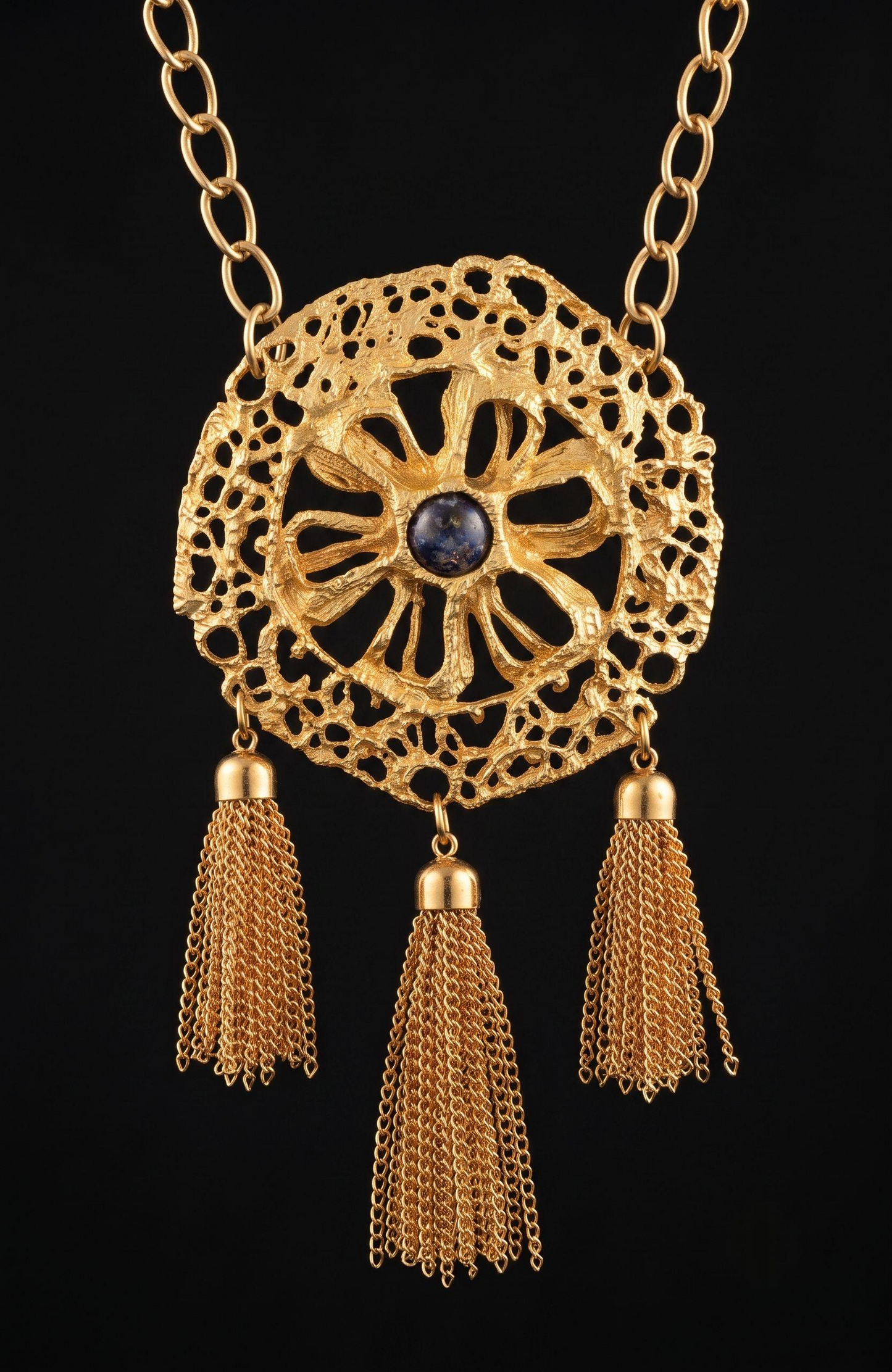 1970s jumbo pendant necklace with blue cabochon stone, and tassels