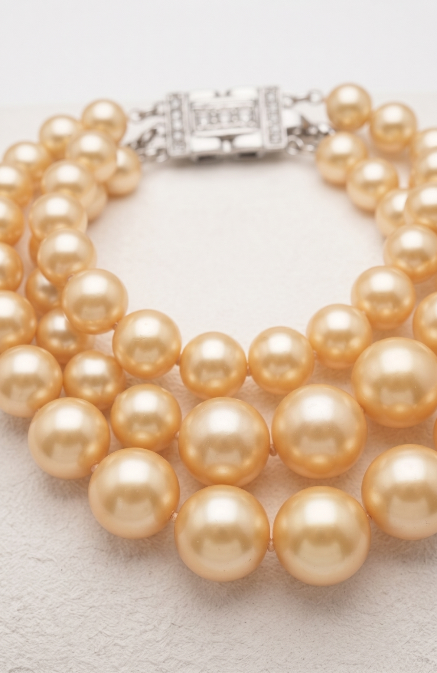 1960s vintage necklace by Kenneth J Ln. three-row necklace with ivory pearls