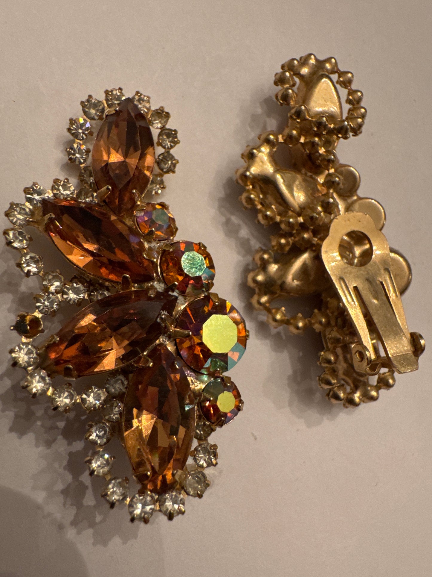 Incredibly sparkly 1950s signed WEISS rhinestone and aurora borealis climber earrings.