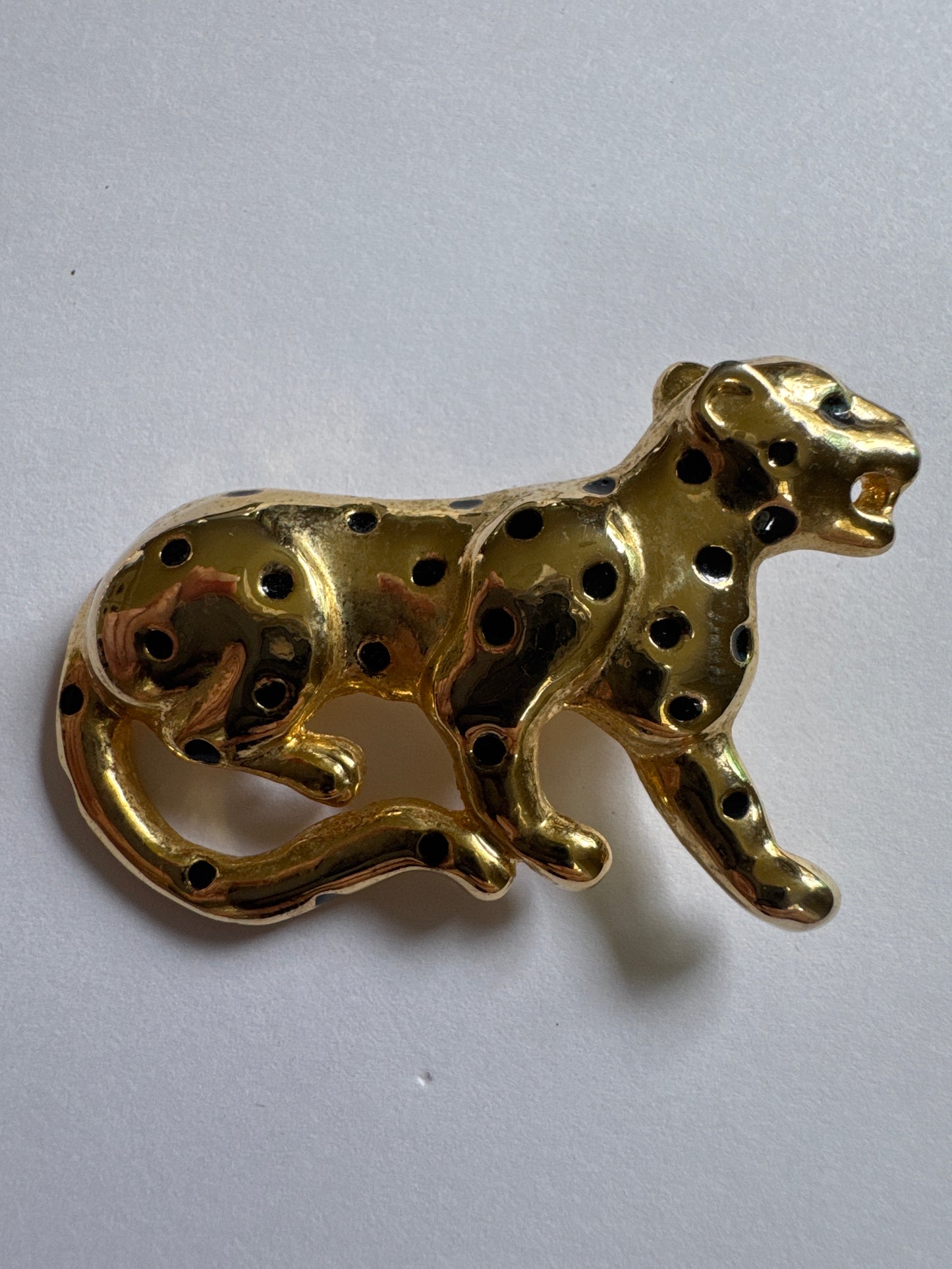 1980s gold tone with black enamel, cheetah brooch