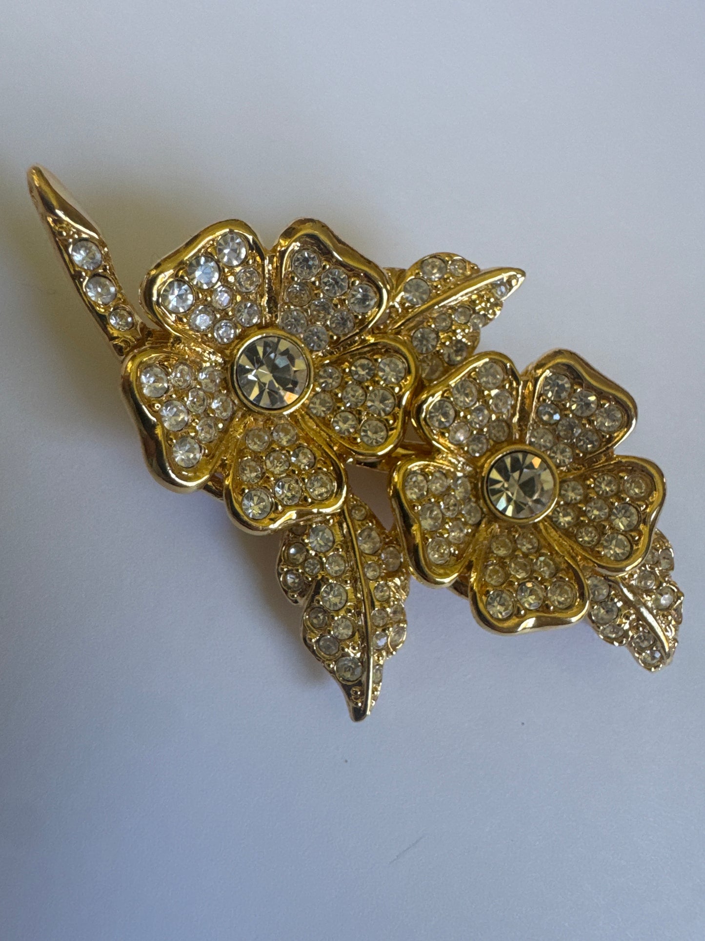 1990s Nolan Miller brooch/convertible earrings that clip on