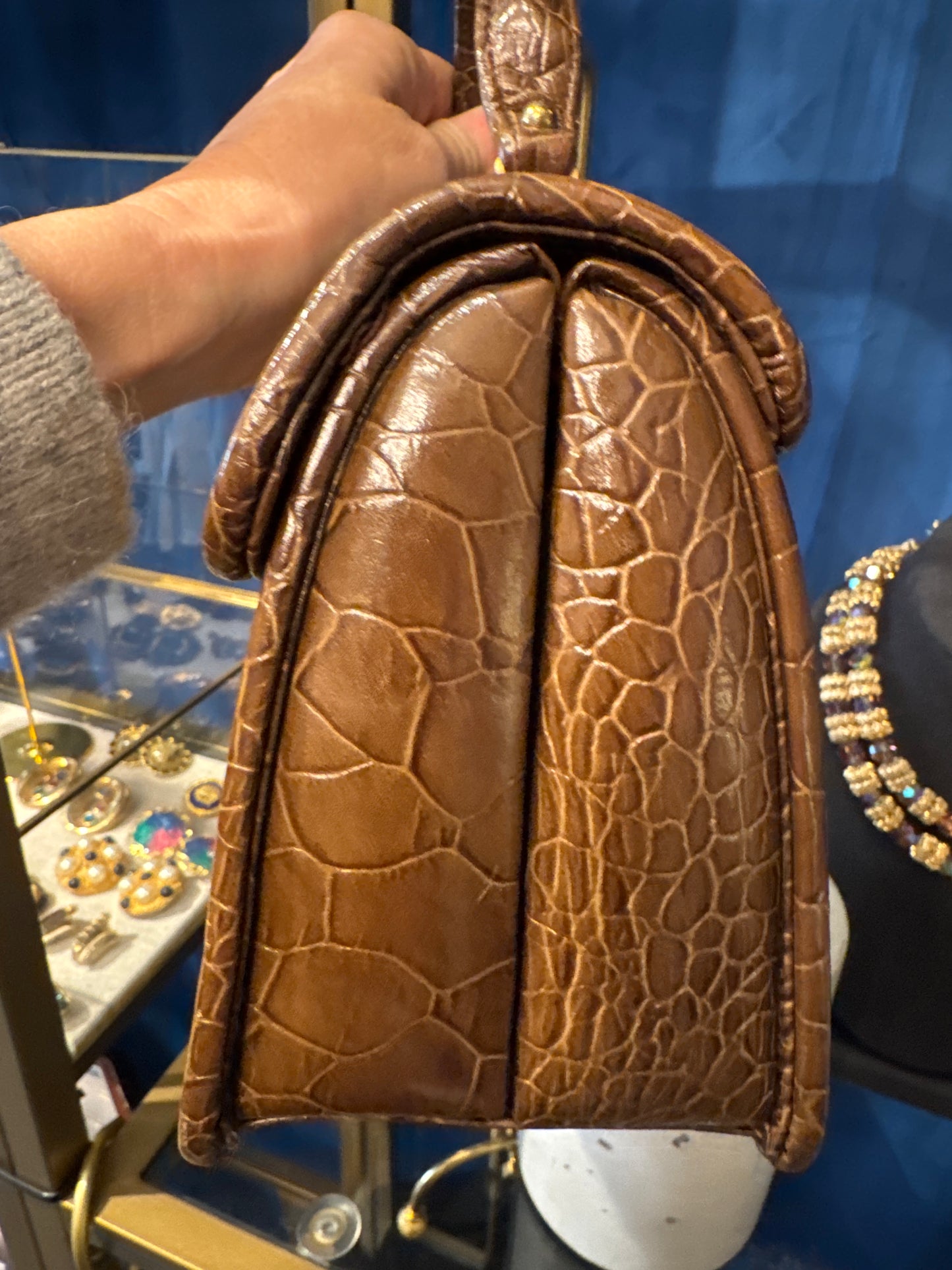 Mid-century taupe top handle embossed handbag with decorative clasp