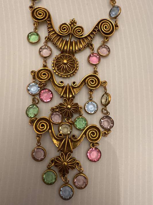 Beautiful gold tone unsigned Goldette dangle pendant with pastel crystals. PARIS LIVE.