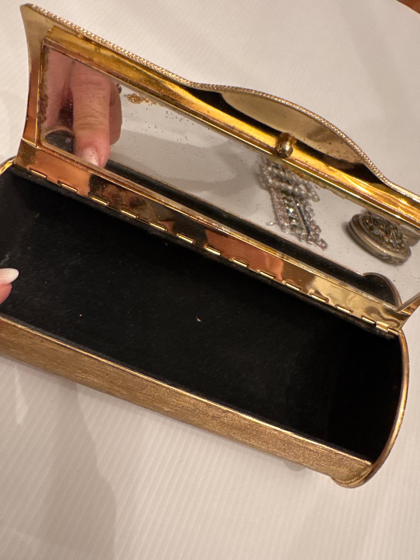 1960s amazing hard top gold tone clutch with fantastic, long mirror and cabachon closure