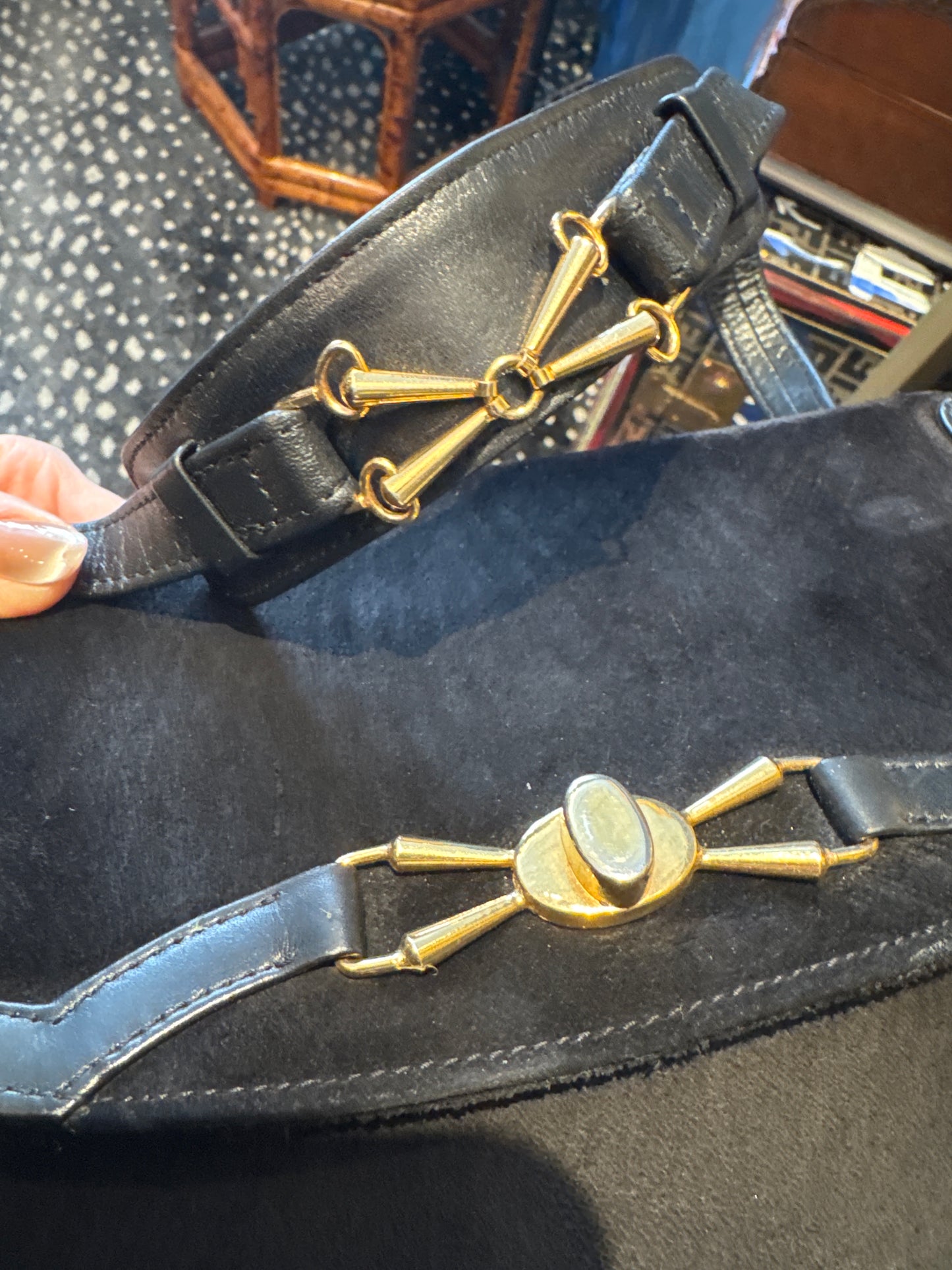 Stunning 1970s black suede with gold hardware shoulder bag. RARE and unique.