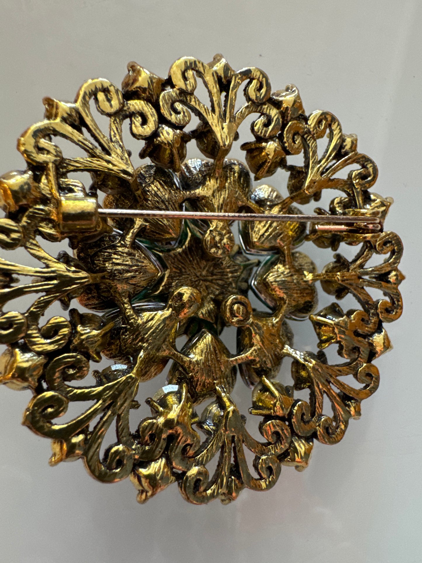 Retro amber colored rhinestone brooch
